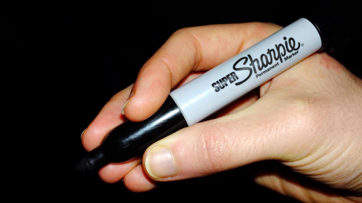 A man and woman have each been charged with multiple felonies in Idaho after they allegedly used the threat of force to take panhandling money from another couple.