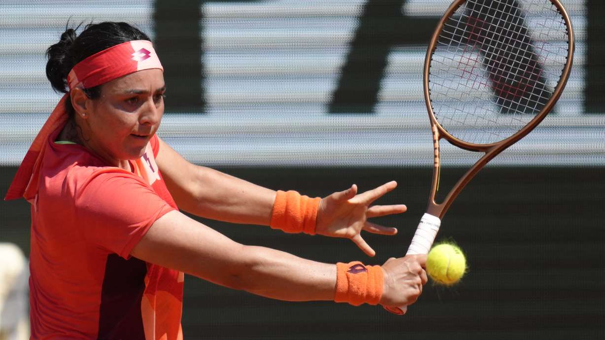 Tunisia's Ons Jabeur plays a shot against Bernarda Pera of the U.S. during their fourth round match of the French Open tennis tournament at the Roland Garros stadium in Paris, Monday, June 5, 2023.