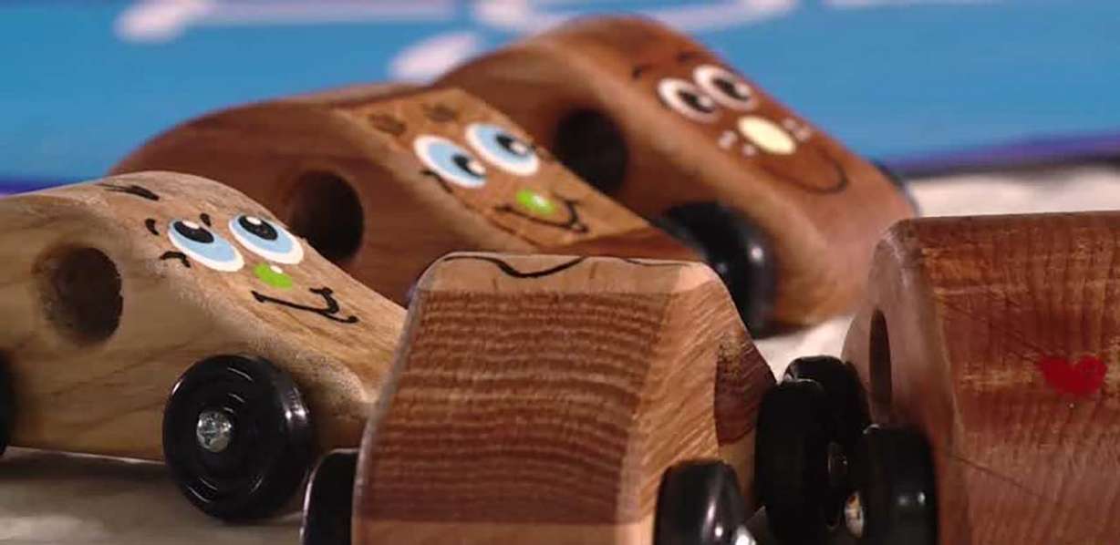 Volunteers make cars from wood at Tiny Tim's Toy Factory in West Jordan.