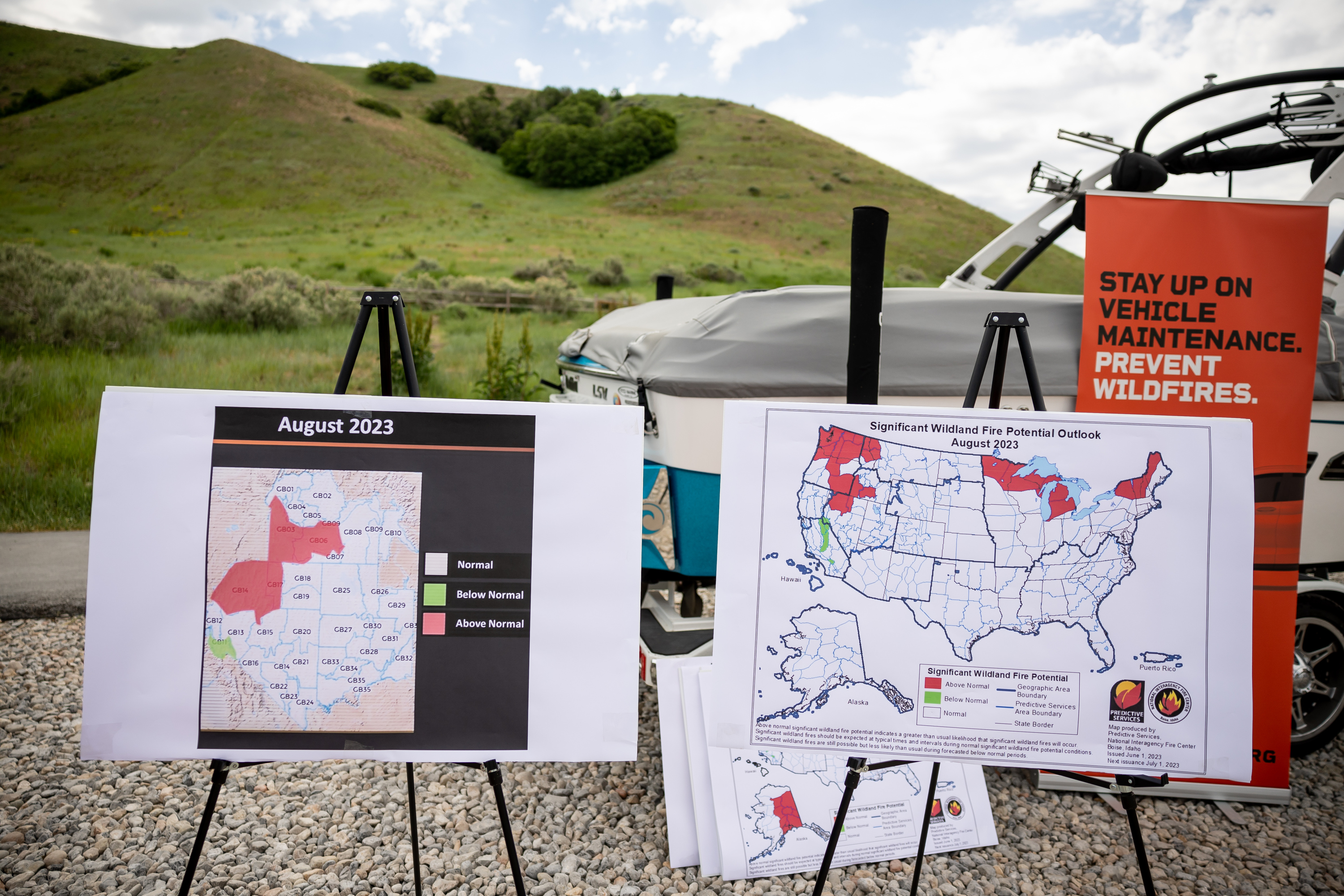 Charts depict wildfire risk during a press conference in North Salt Lake on Monday.