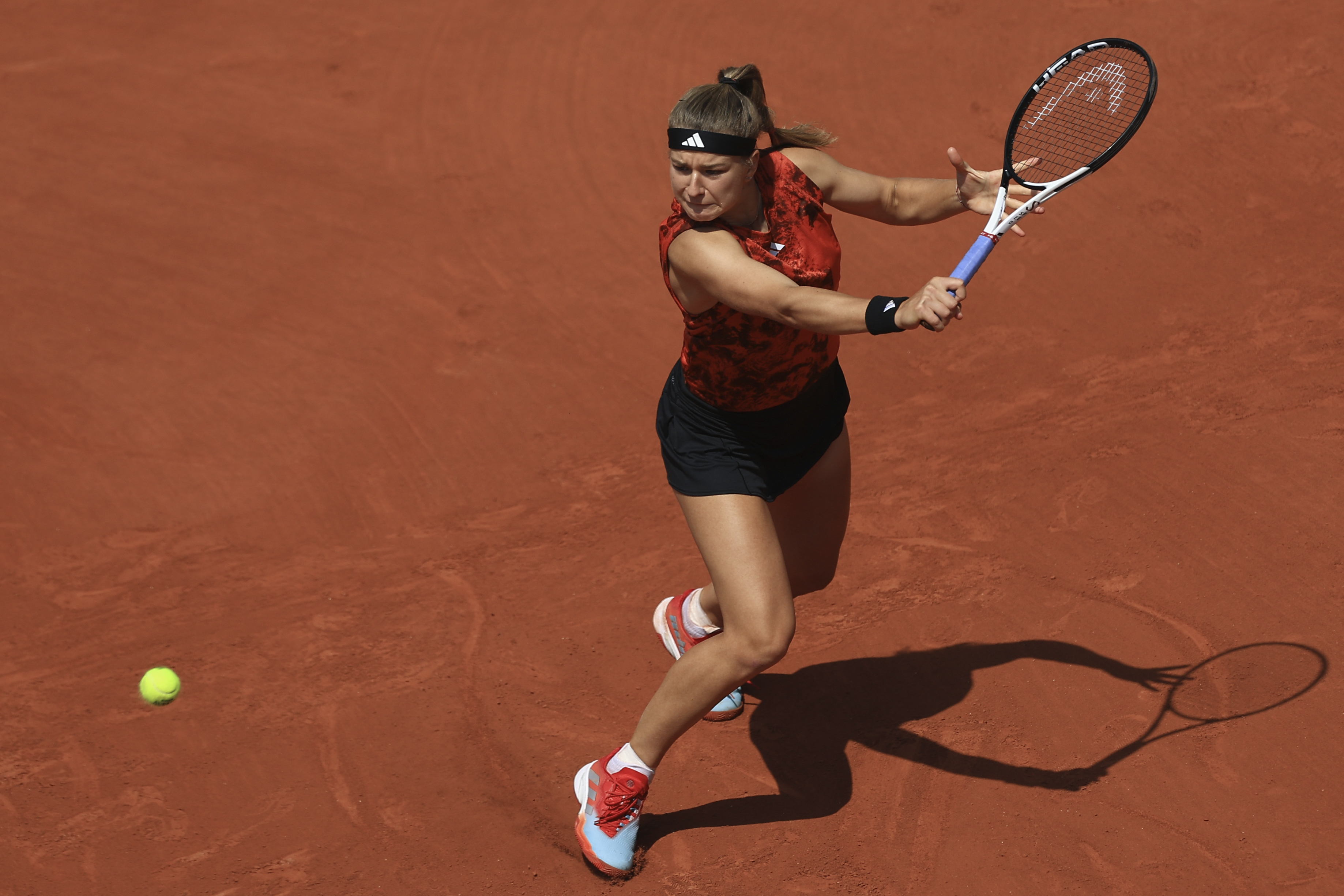 Karolina Muchova of the Czech Republic plays a shot against Russia's Anastasia Pavlyuchenkova during their quarter final match of the French Open tennis tournament at the Roland Garros stadium in Paris, Tuesday, June 6, 2023.