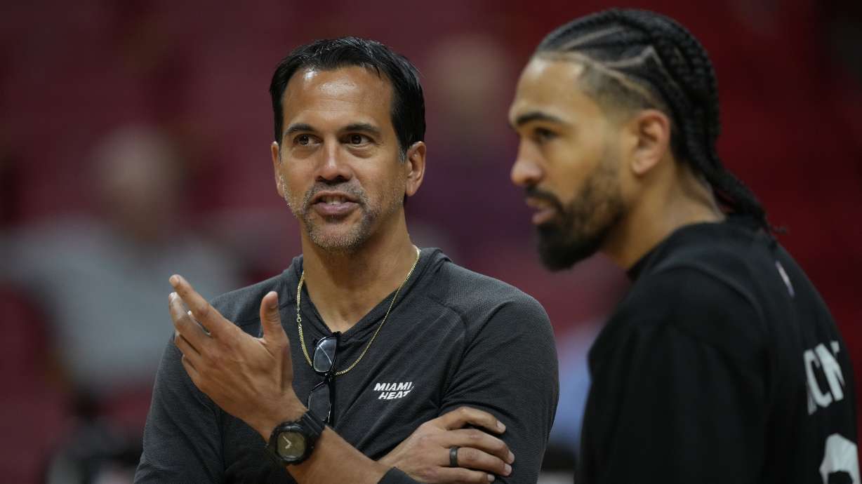 Miami Heat head coach Erik Spoelstra, left, talks with Miami Heat guard Gabe Vincent during a practice ahead of Game 3 of the NBA Finals, at the Kaseya Center in Miami, Tuesday, June 6, 2023.