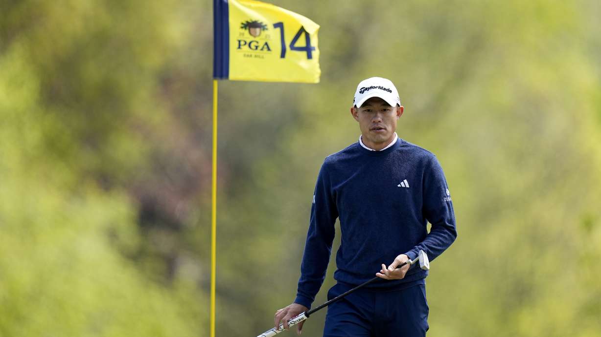 Collin Morikawa lines up a putt on the 14th hole during a practice round for the PGA Championship golf tournament at Oak Hill Country Club on Wednesday, May 17, 2023, in Pittsford, N.Y.