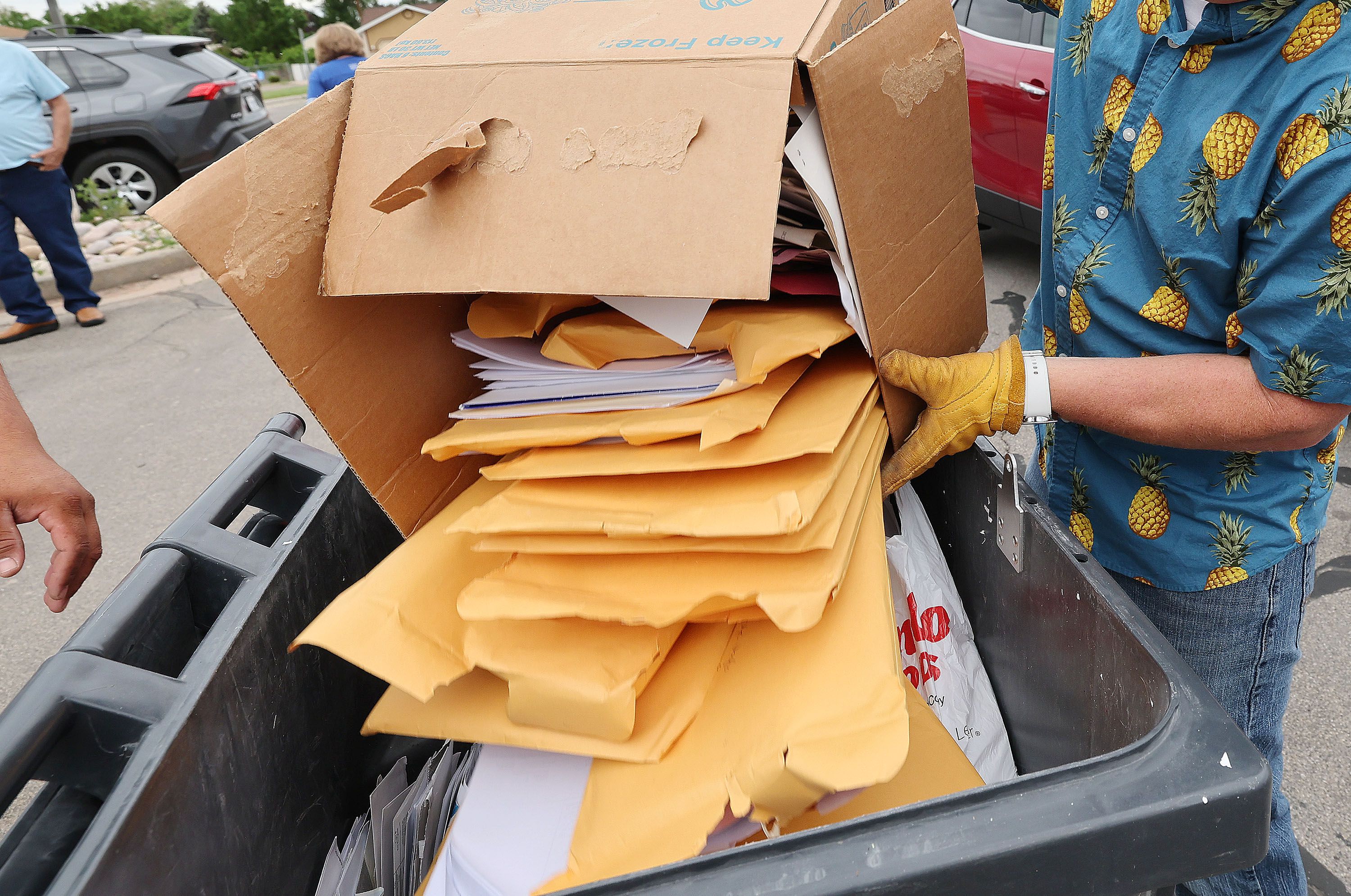 Documents are shredded at the Roy Hillside Senior Center in Roy on June 2.