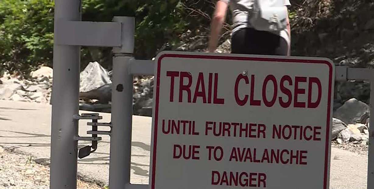 A signs warn visitors that the trail is closed at Bridal Veil Falls in Provo Canyon following an avalanche in January. Some people are ignoring the signs and recreating in dangerous areas, officials say.