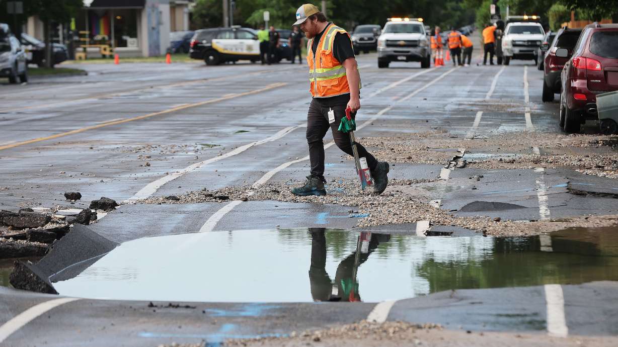 Public Utilities work on a water main break at 800 South and 300 East in Salt Lake City on Wednesday.