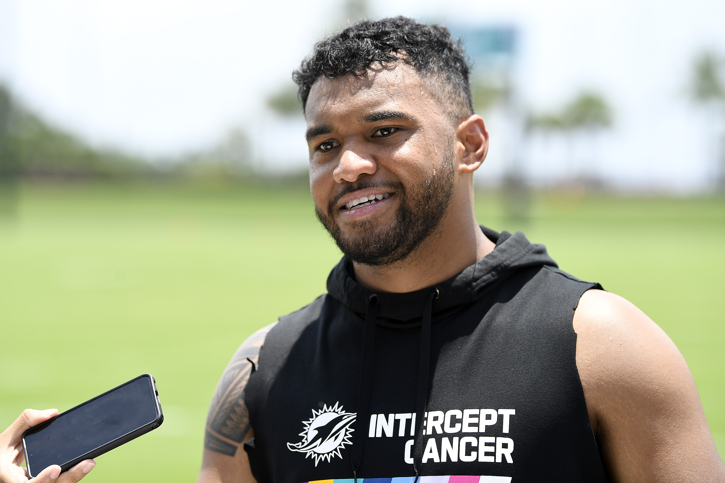 Miami Dolphins quarterback Tua Tagovailoa speaks to the news media after practice at the NFL football team's training facility, Wednesday, June 7, 2023, in Miami Gardens, Fla.