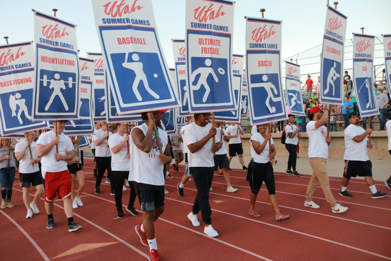 Participants carry banners at the Utah Summer Games opening ceremonies in Cedar City on June 14, 2018. The 38th annual Summer Games, now already underway in Cedar City, will stage its opening ceremonies on Friday night.