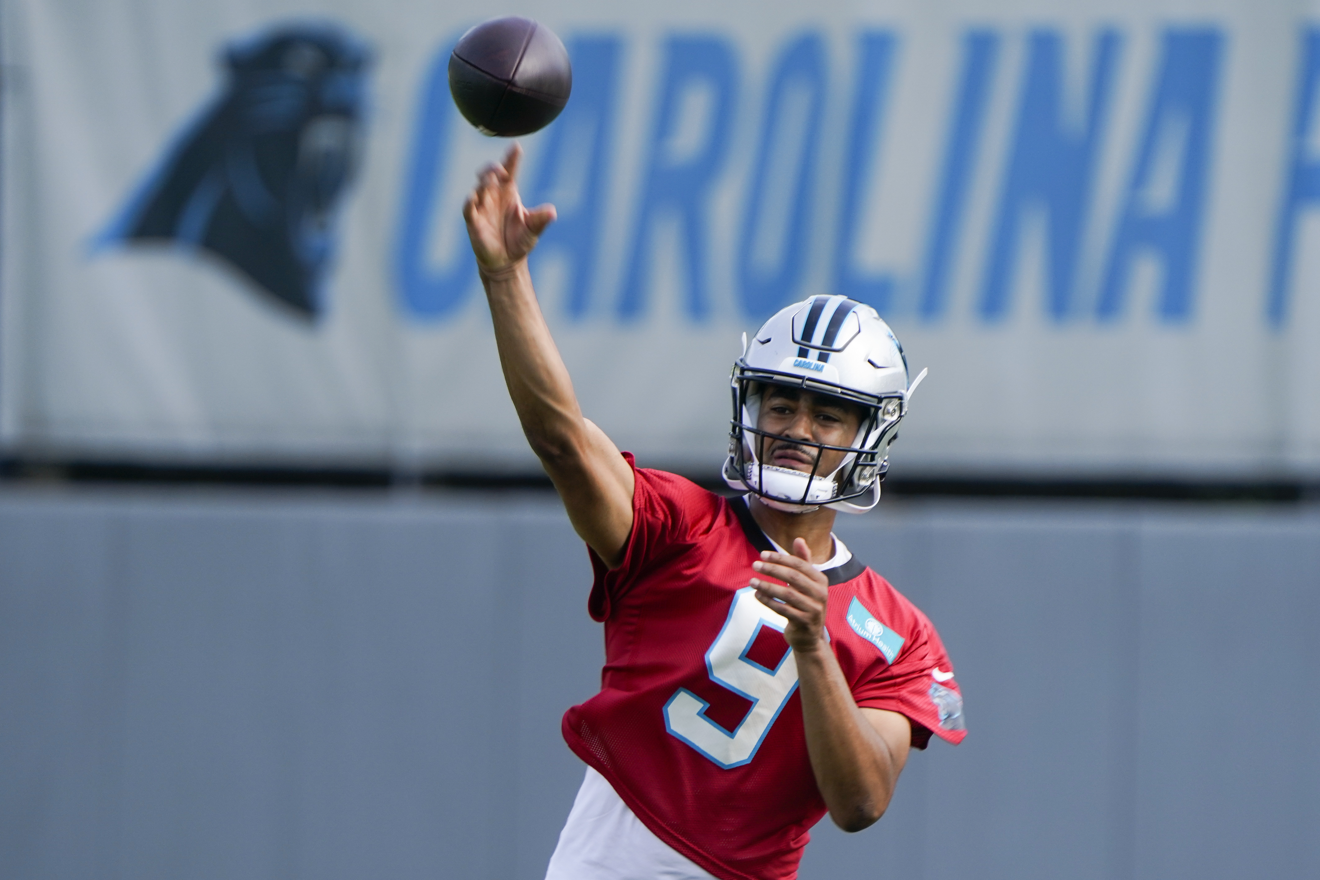 Carolina Panthers quarterback Bryce Young (9) throws a pass during NFL football practice, Thursday, June 1, 2023, in Charlotte, N.C.