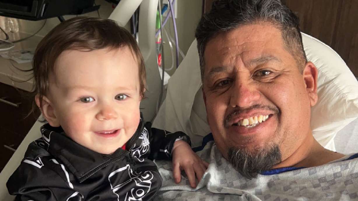 Miguel Badillo and his grandson, Kyng, in the hospital where Badillo is receiving treatment for acute lymphoblastic leukemia. Badillo's family has started a fundraiser to help pay for his medical expenses.