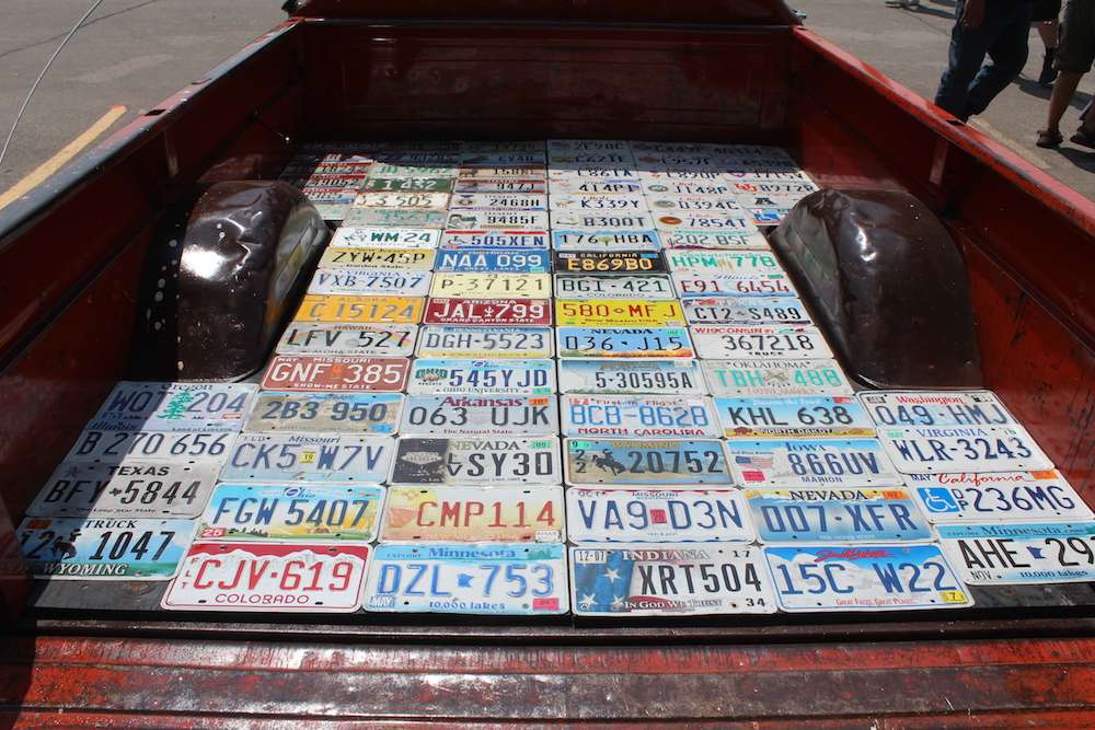 With the wood rotted away, Marty Carrillo lined the bed of his 1963 two-wheel-drive truck with license plates. He said he does not have all 50 states, and there's not a theme or pattern to how they were applied.