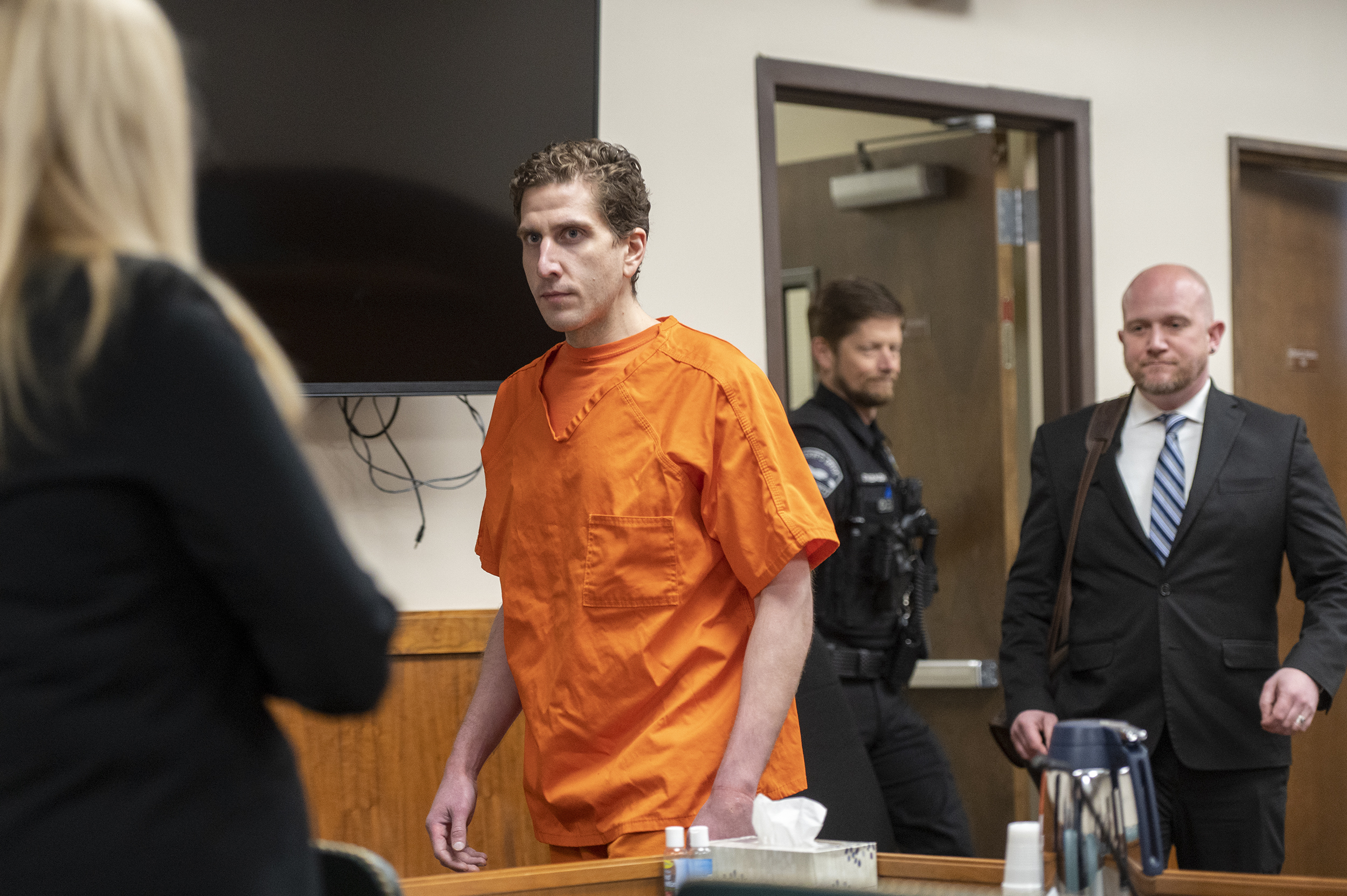 Bryan Kohberger, charged with killing four University of Idaho students, enters the courtroom for his arraignment hearing in Latah County District Court, May 22, in Moscow, Idaho. A judge overseeing the case against Kohberger is set to hear arguments Friday over a gag order.