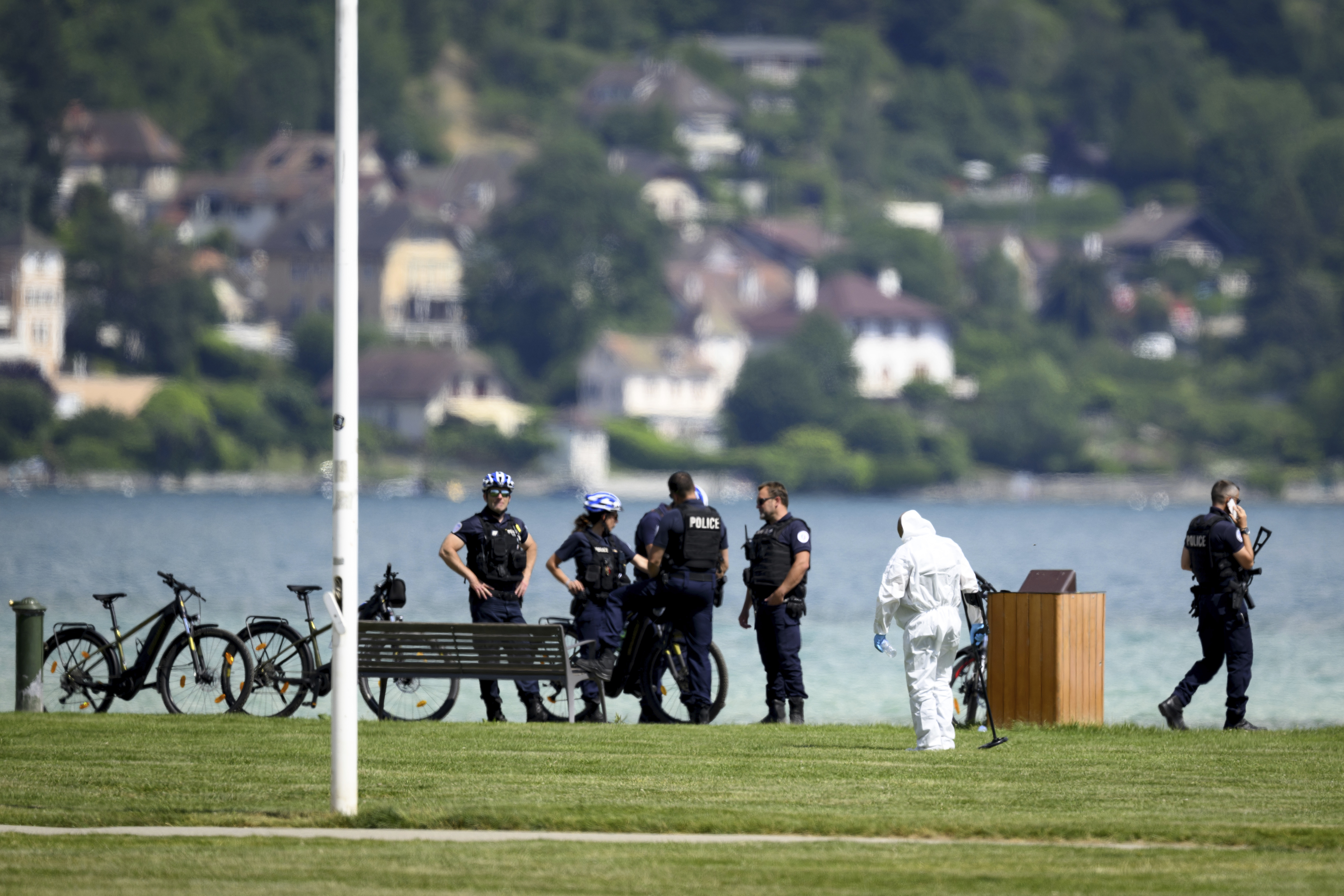 Security forces examine the scene of a knife attack in Annecy, France, Thursday.