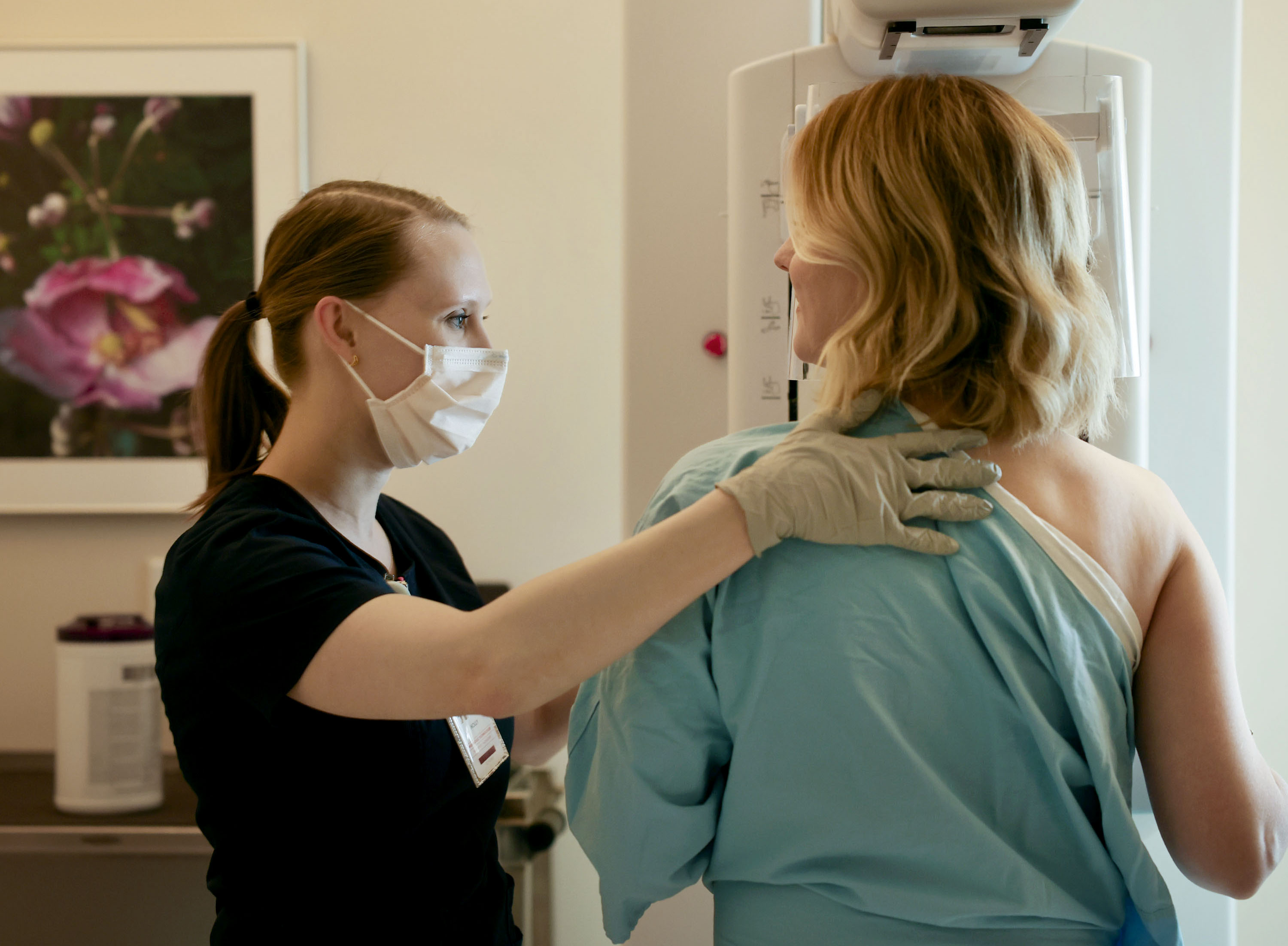 Radiologic technologist Holly Speer performs a mammogram on Heather Simonsen at the Huntsman Cancer Hospital in Salt Lake City on April 7. Utah failed to meet its goal of screening 76% of women aged 40 or older by 2020, officials said. 
