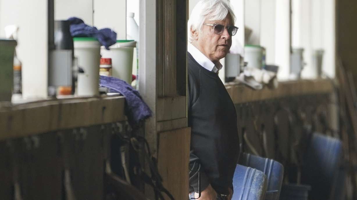 Trainer Bob Baffert surveys the stables as workouts continue ahead of the Belmont Stakes horse race, Friday, June 9, 2023, at Belmont Park in Elmont, N.Y.