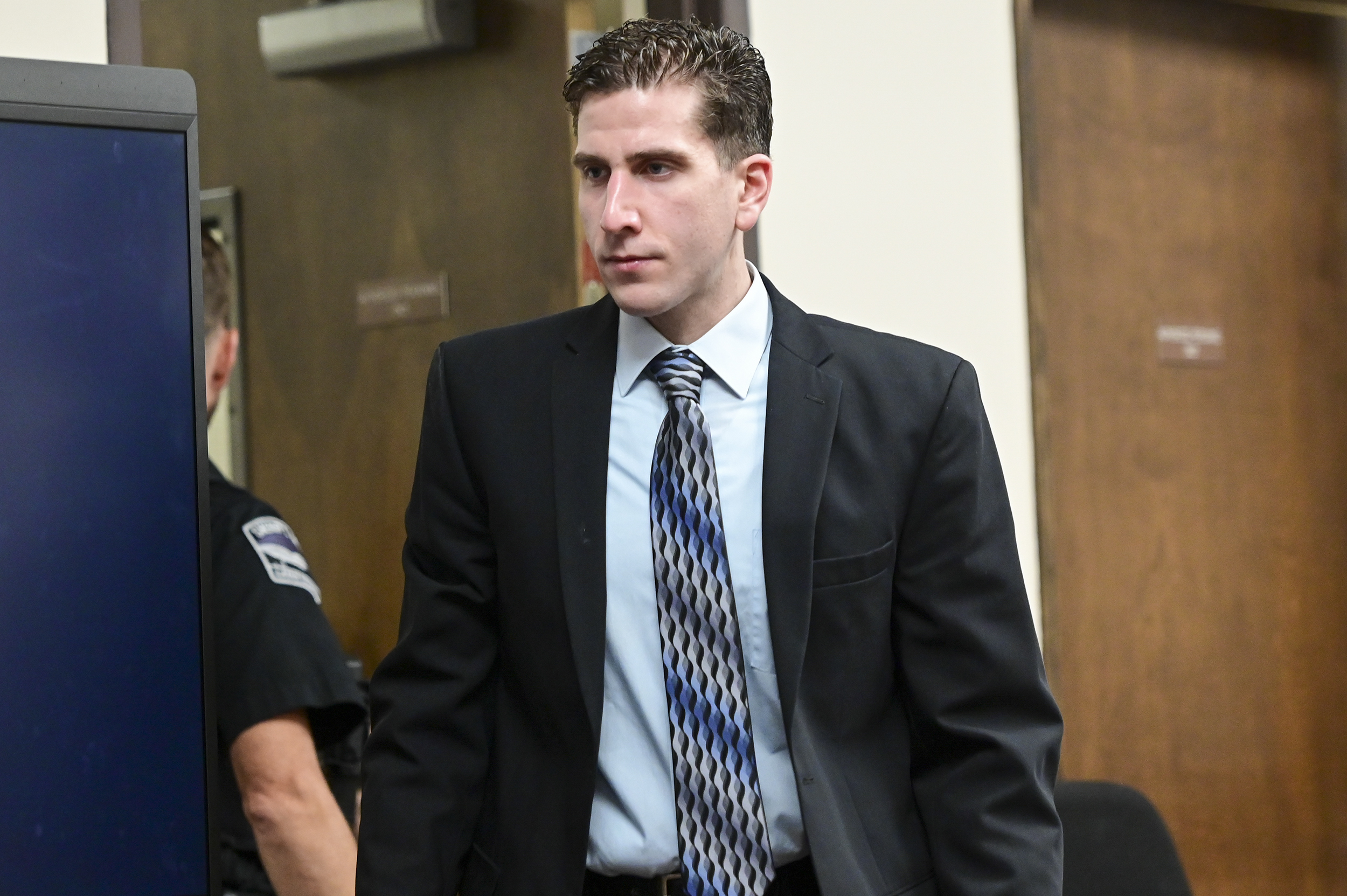 Bryan Kohberger enters the courtroom for a motion hearing regarding a gag order, June 9, in Moscow, Idaho. Kohberger is accused of killing four University of Idaho students. His DNA is a "statistical match" to DNA collected from the sheath of a knife found at the scene, according to court documents. 