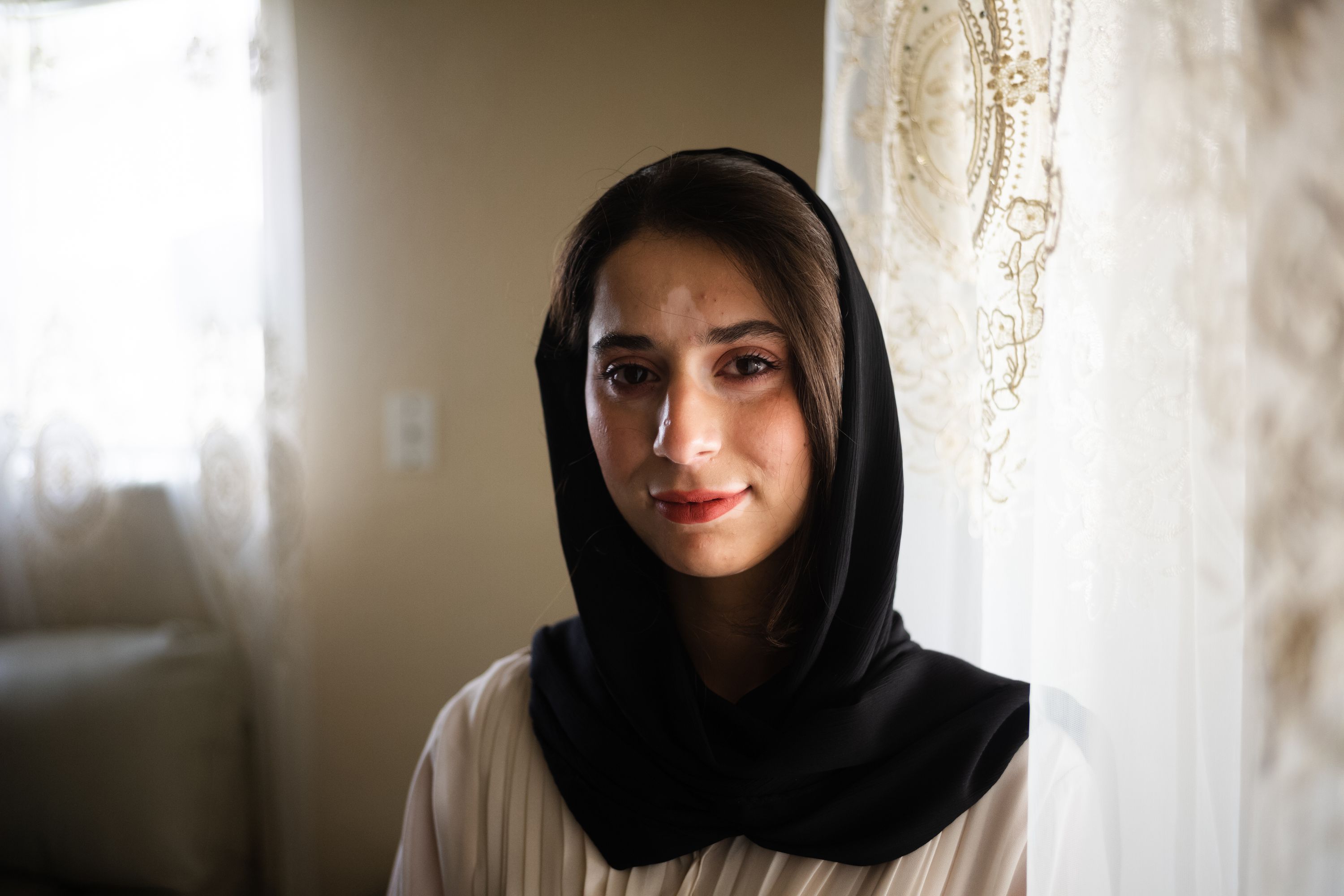 Mahsa Qaderi, an Afghani refugee by way of Kabul, poses for a portrait at her home in West Valley City on Friday. Qaderi is a young girl from Afghanistan whose dream of becoming a computer programmer was thwarted by high tuition costs.