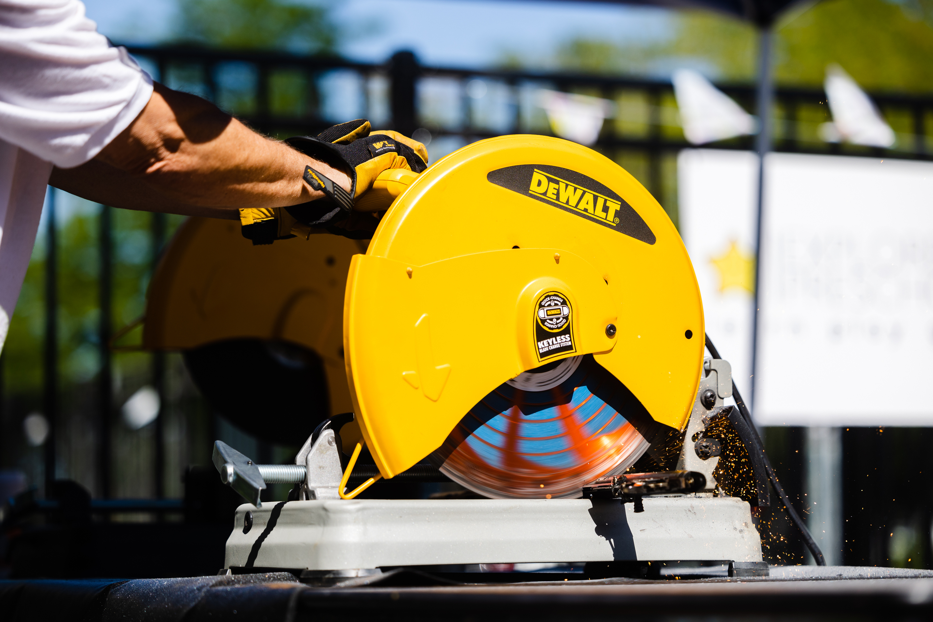 Mark Gilfillan uses a mechanical saw to cut a firearm during an event disarming firearms at the Christ United Methodist Church in Salt Lake City on Saturday.