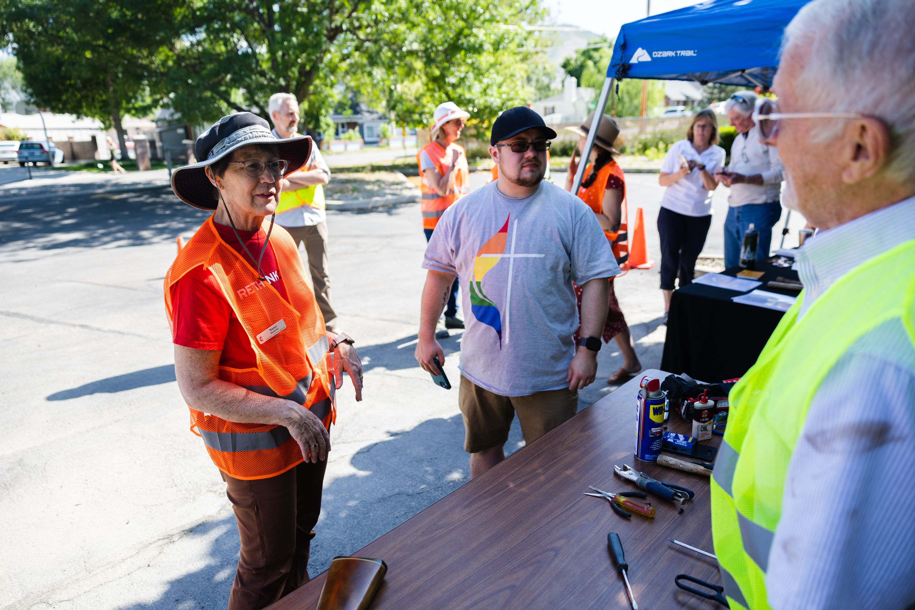 Nanci Bockelie speaks with Bruce Travis during an event disarming firearms at the Christ United Methodist Church in Salt Lake City on Saturday.
