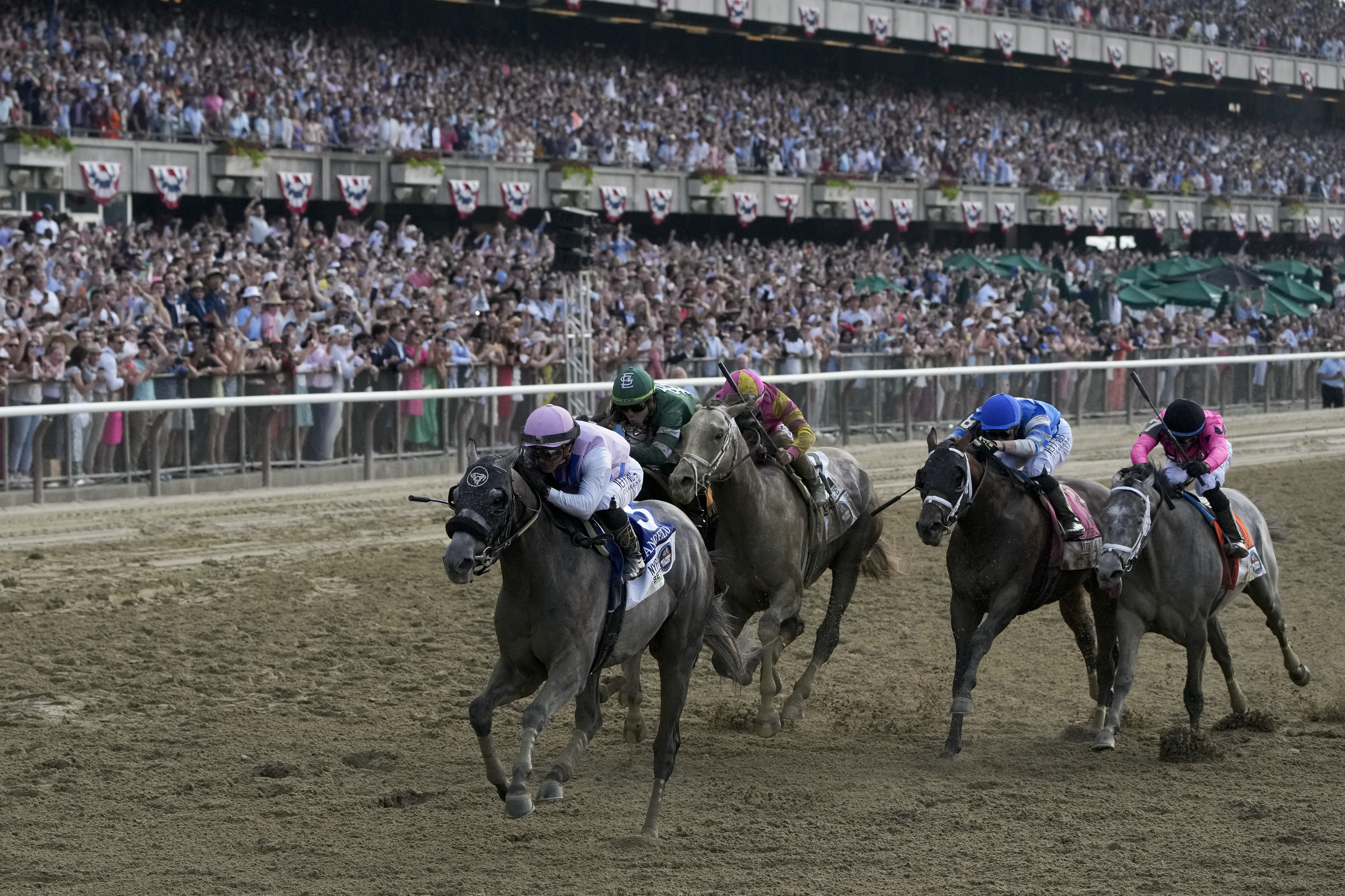 Arcangelo, with jockey Javier Castellano, crosses the finish line to win the 155th running of the Belmont Stakes horse race, Saturday, June 10, 2023, at Belmont Park in Elmont, N.Y. 