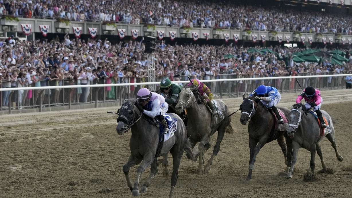 Arcangelo, with jockey Javier Castellano, crosses the finish line to win the 155th running of the Belmont Stakes horse race, Saturday, June 10, 2023, at Belmont Park in Elmont, N.Y.