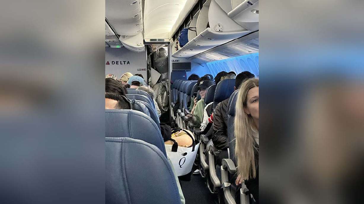 A slide inside of a Delta Airlines plane accidentally deployed while on the ground at Salt Lake International Airport on Saturday.