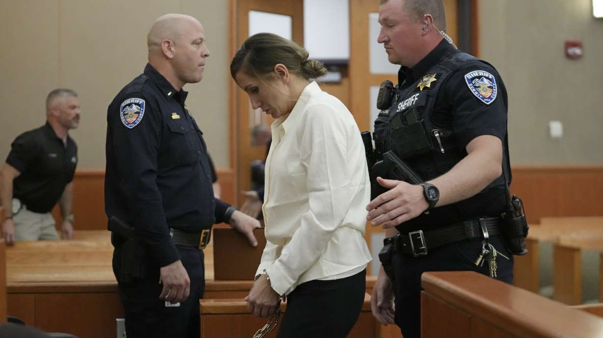 Kouri Richins walks out of the court during a recess at a bail hearing on June 12, 2023, in Park City. A judge ruled to keep her in custody for the duration of her trial.