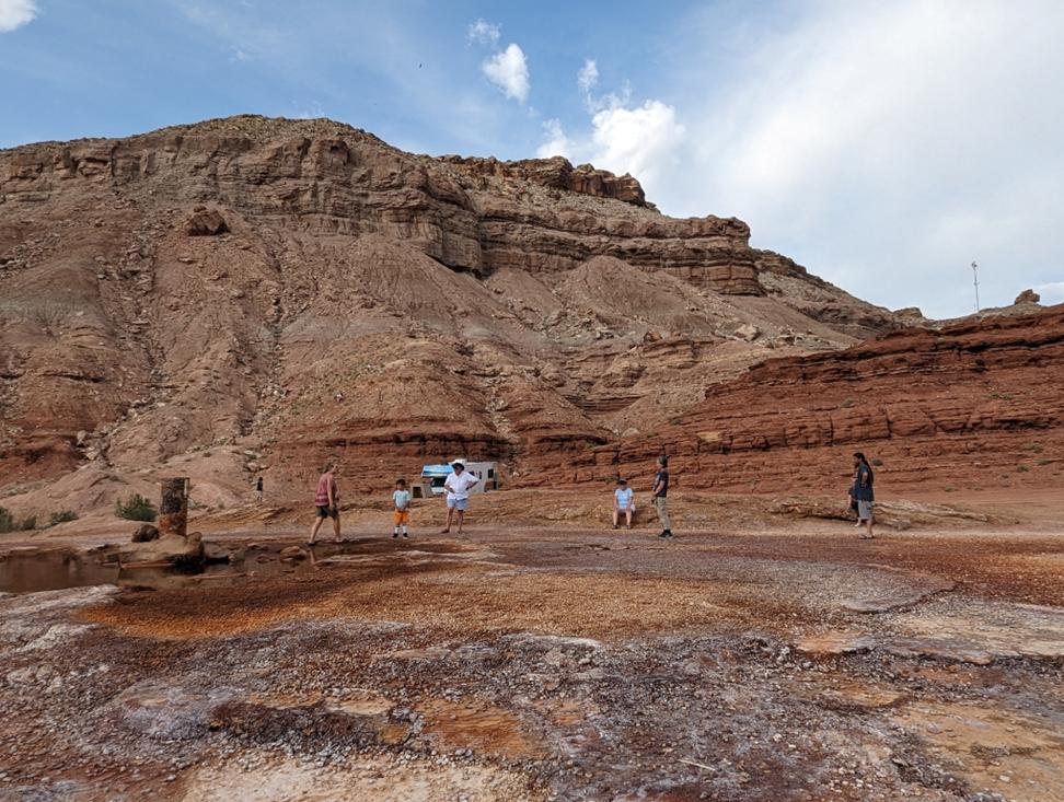 People from around the world, including France, Florida, and Utah wait for Crystal Geyser to erupt.