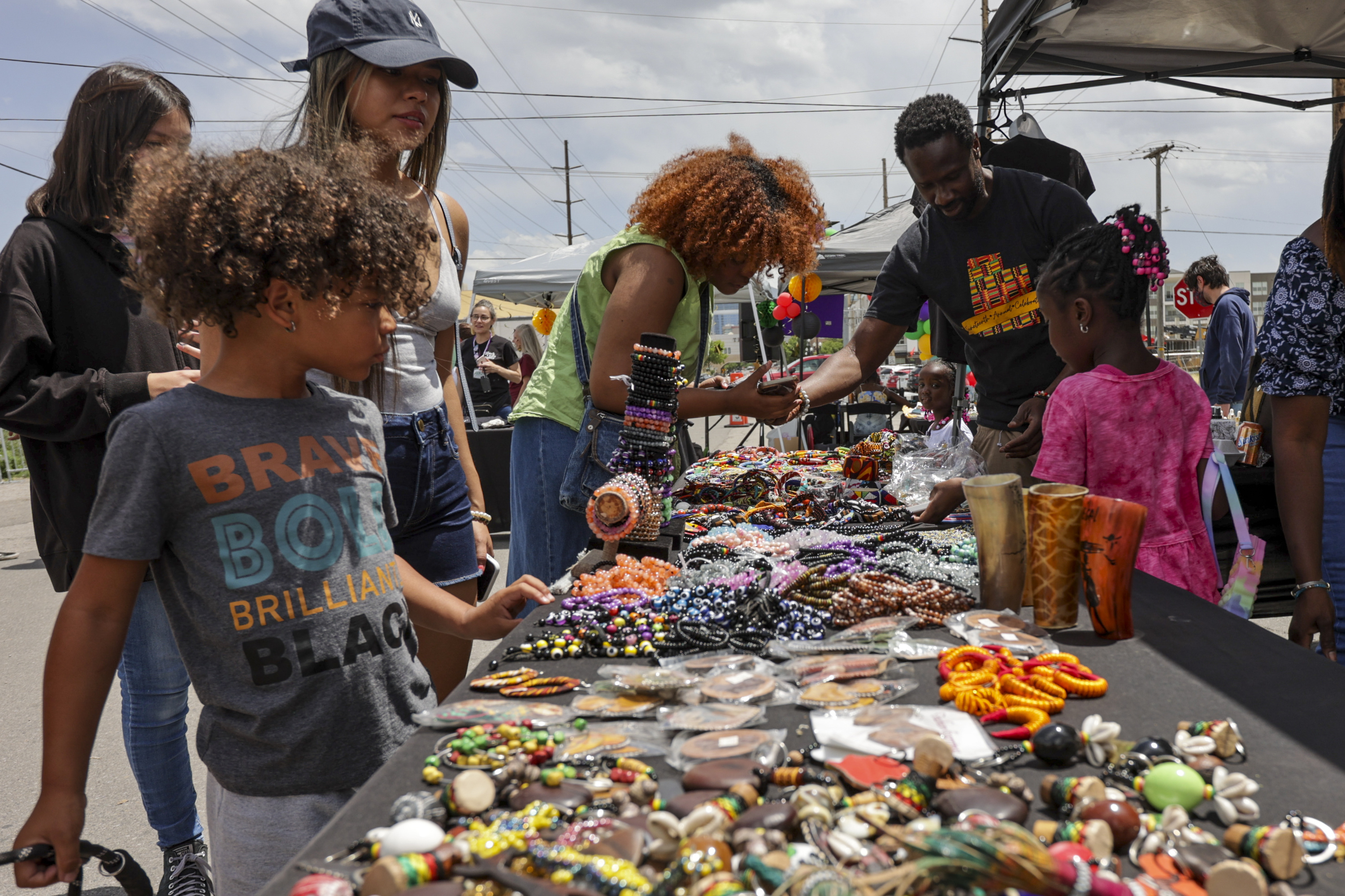 People shop at Safari Beauty Supply at the Summer of Color Juneteenth celebration on June 19, 2022, in Salt Lake City. This year is Utah's second Juneteenth state holiday.
