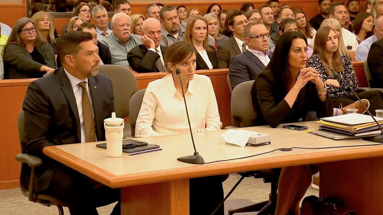 Kouri Richins, center, appears in a Park City courtroom on June 12. The estate of her husband has now filed a multimillion-dollar civil lawsuit against her. Richins is charged with murdering Eric Richins by giving him a fatal dose of fentanyl.