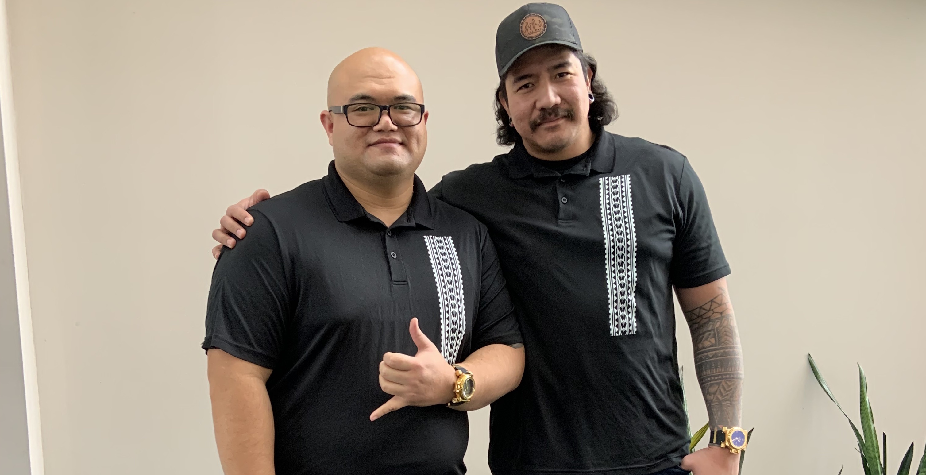 Podcasters Michael Tan, left, and Johnny Sualevai, right, of "Behind the Lavalava" pose for a photo on Jan. 27. The podcast focuses on experiences within the Samoan and Samoan American community.