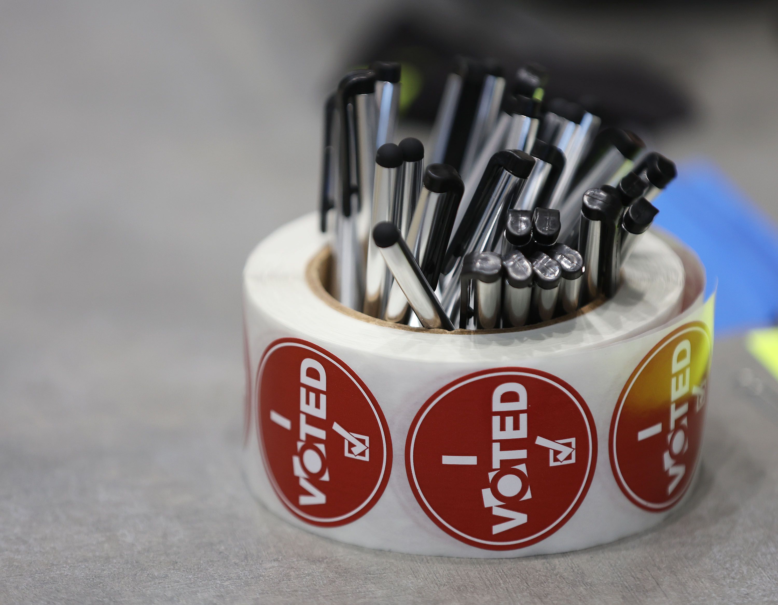 “I voted” stickers and pens on Election Day in Cottonwood Heights on Nov. 8, 2022. The Utah Legislature will meet in a special session Tuesday to change election dates in order to hold a special election to replace Rep. Chris Stewart.