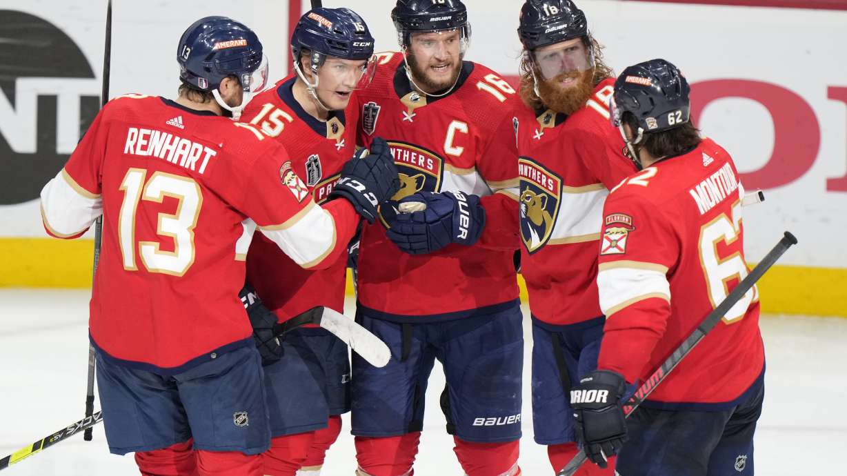 Florida Panthers defenseman Aaron Ekblad (5) talks to his teammates after scoring a goal during the third period in Game 4 of the NHL hockey Stanley Cup Finals against the Vegas Golden Knights, Saturday, June 10, 2023, in Sunrise, Fla.