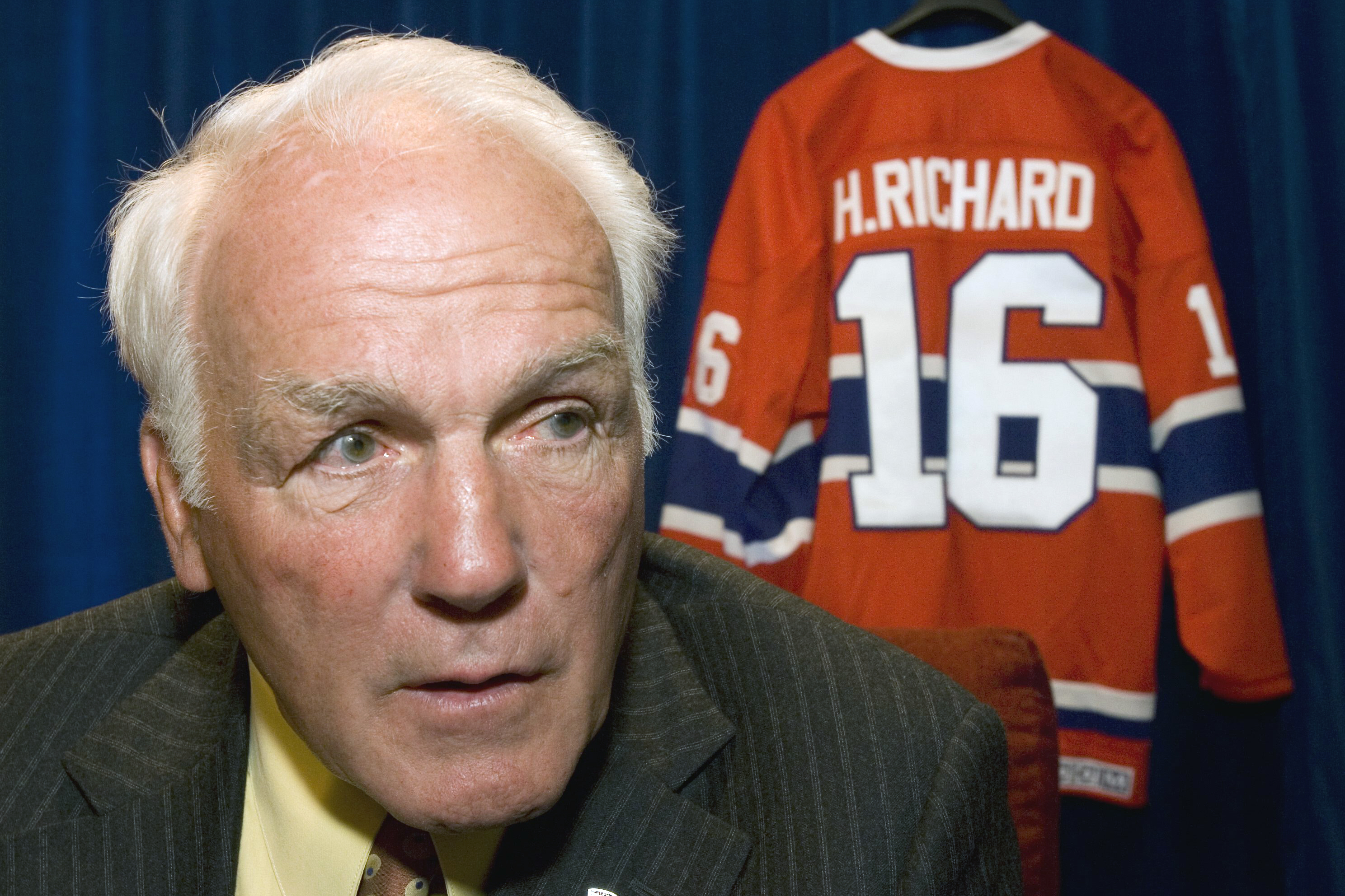 FILE - Montreal Canadiens' Henri Richard responds to questions in Ottawa, June 1, 2007. Richard’s family says the Hockey Hall of Famer has been diagnosed with chronic traumatic encephalopathy, the degenerative brain disease linked to concussions. Richard, who died in 2020 at the age of 84, was diagnosed with Stage 3 CTE – the second-most severe classification -- by Dr. Stephen Saikali at Université Laval in Québec City. 