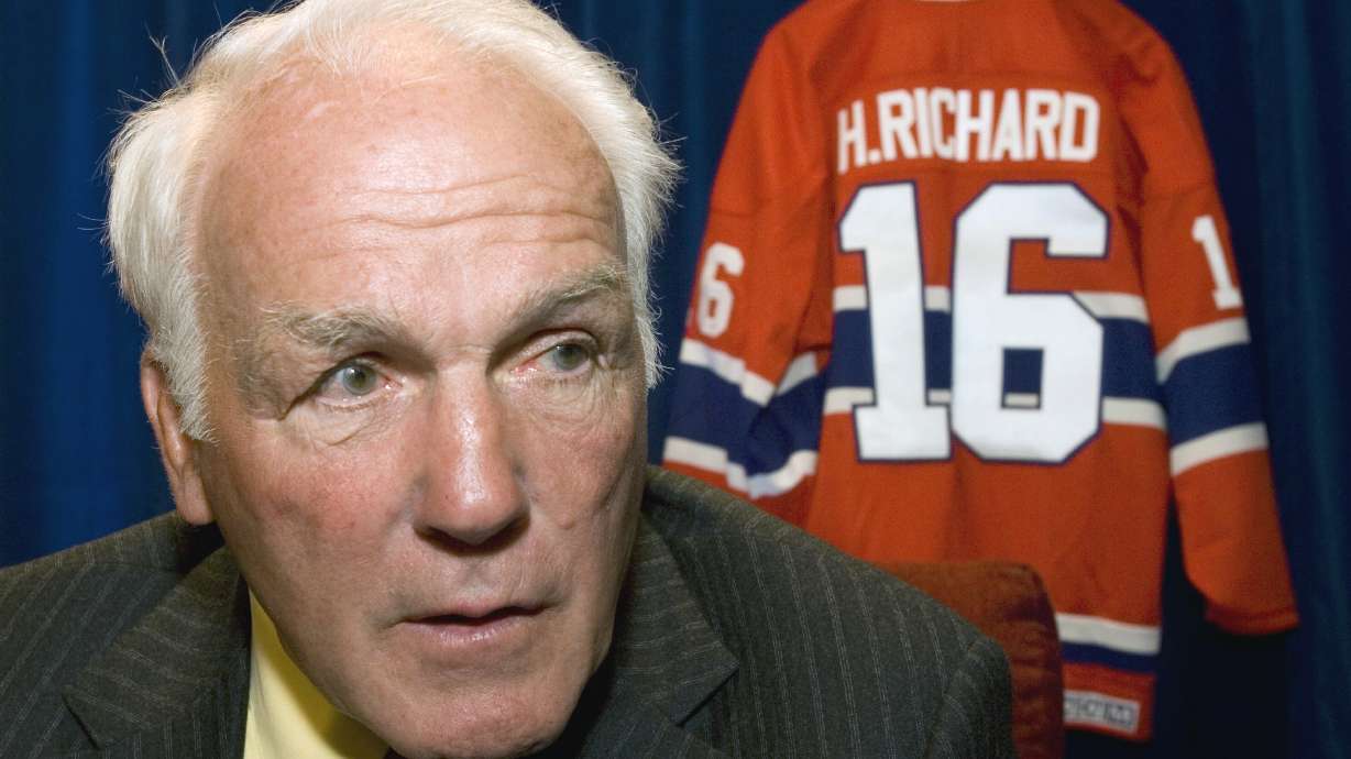 FILE - Montreal Canadiens' Henri Richard responds to questions in Ottawa, June 1, 2007. Richard’s family says the Hockey Hall of Famer has been diagnosed with chronic traumatic encephalopathy, the degenerative brain disease linked to concussions. Richard, who died in 2020 at the age of 84, was diagnosed with Stage 3 CTE – the second-most severe classification -- by Dr. Stephen Saikali at Université Laval in Québec City.
