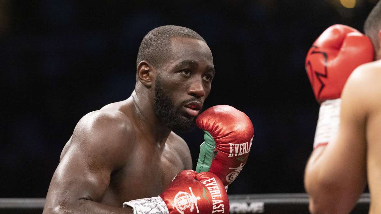 FILE - Terence "Bud" Crawford, left, fights David Avanesyan during a WBO welterweight title boxing bout on Saturday, Dec. 10, 2022, in Omaha, Neb. Crawford and Errol Spence Jr. will meet in a much anticipated showdown when they fight for the undisputed welterweight championship July 29, 2023, in Las Vegas.