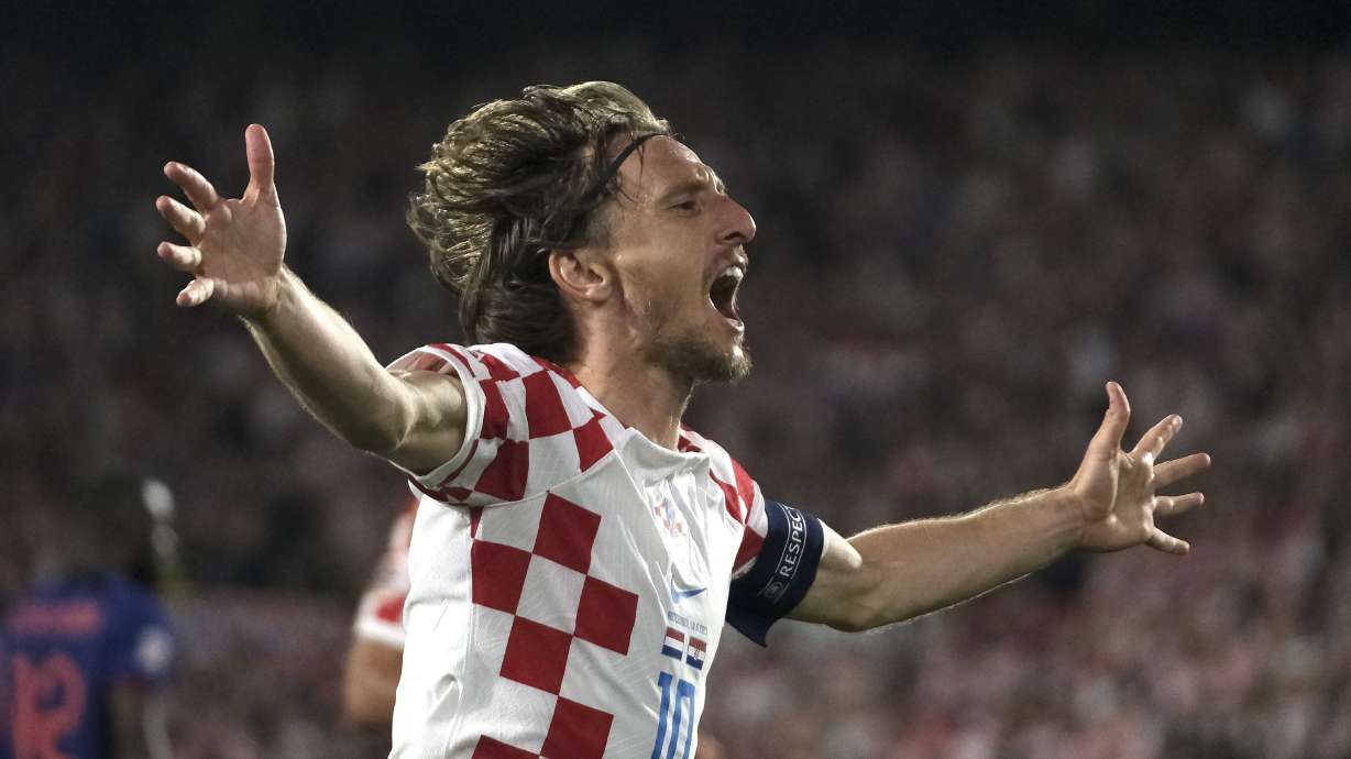 Croatia's Luka Modric celebrates after scoring his side's fourth goal against Netherlands during the Nations League semifinal soccer match between the Netherlands and Croatia at De Kuip stadium in Rotterdam, Netherlands, Wednesday, June 14, 2023.