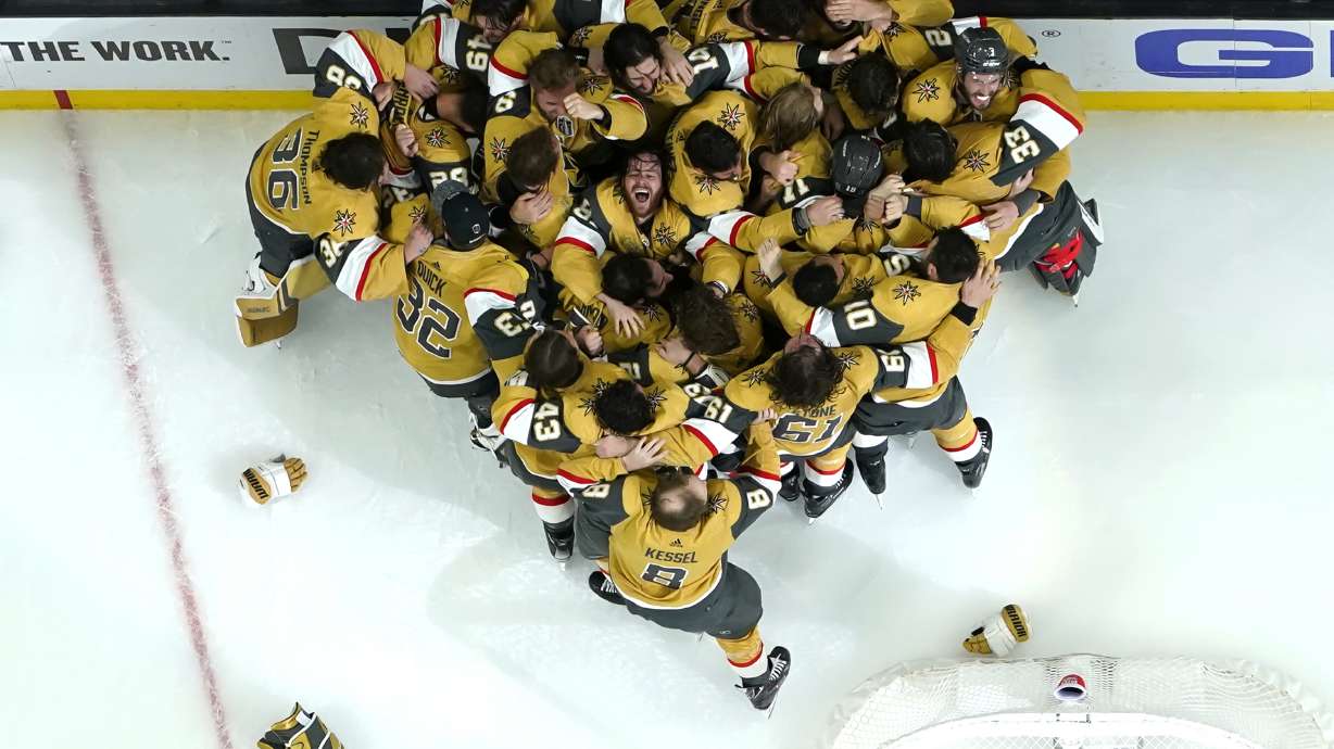 Members of the Vegas Golden Knights celebrate after they defeated the Florida Panthers 9-3 to win the Stanley Cup in Game 5 of the NHL hockey Stanley Cup Finals Tuesday, June 13, 2023, in Las Vegas.
