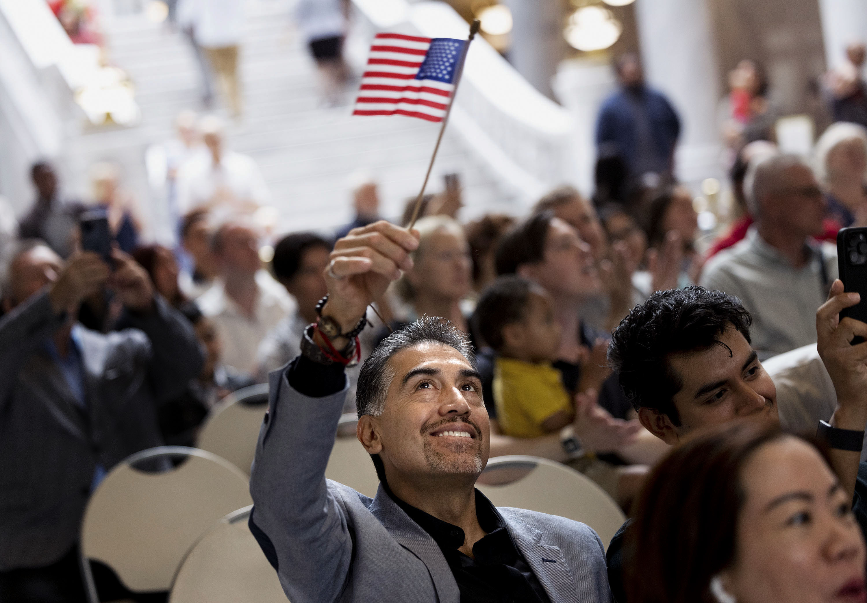 Andres Cruz, originally from Mexico, attends a naturalization ceremony at the Capitol in Salt Lake City on Wednesday.