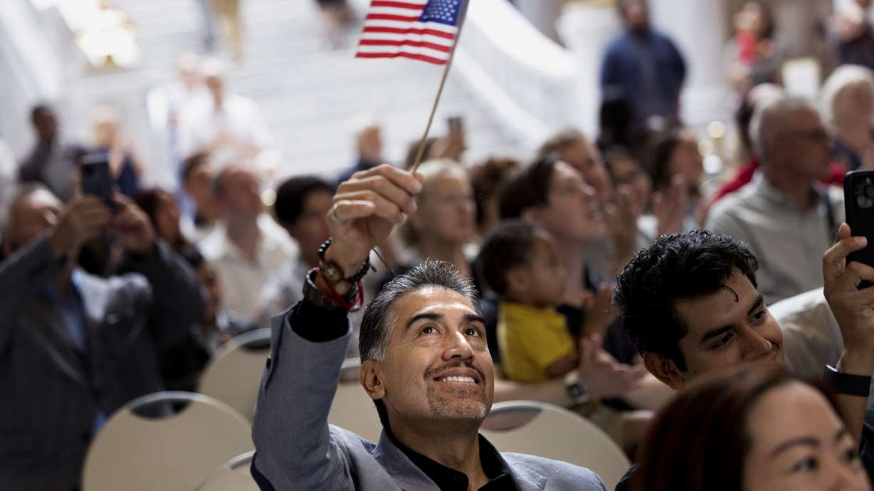 Andres Cruz, originally from Mexico, attends a naturalization ceremony at the Capitol in Salt Lake City on Wednesday.