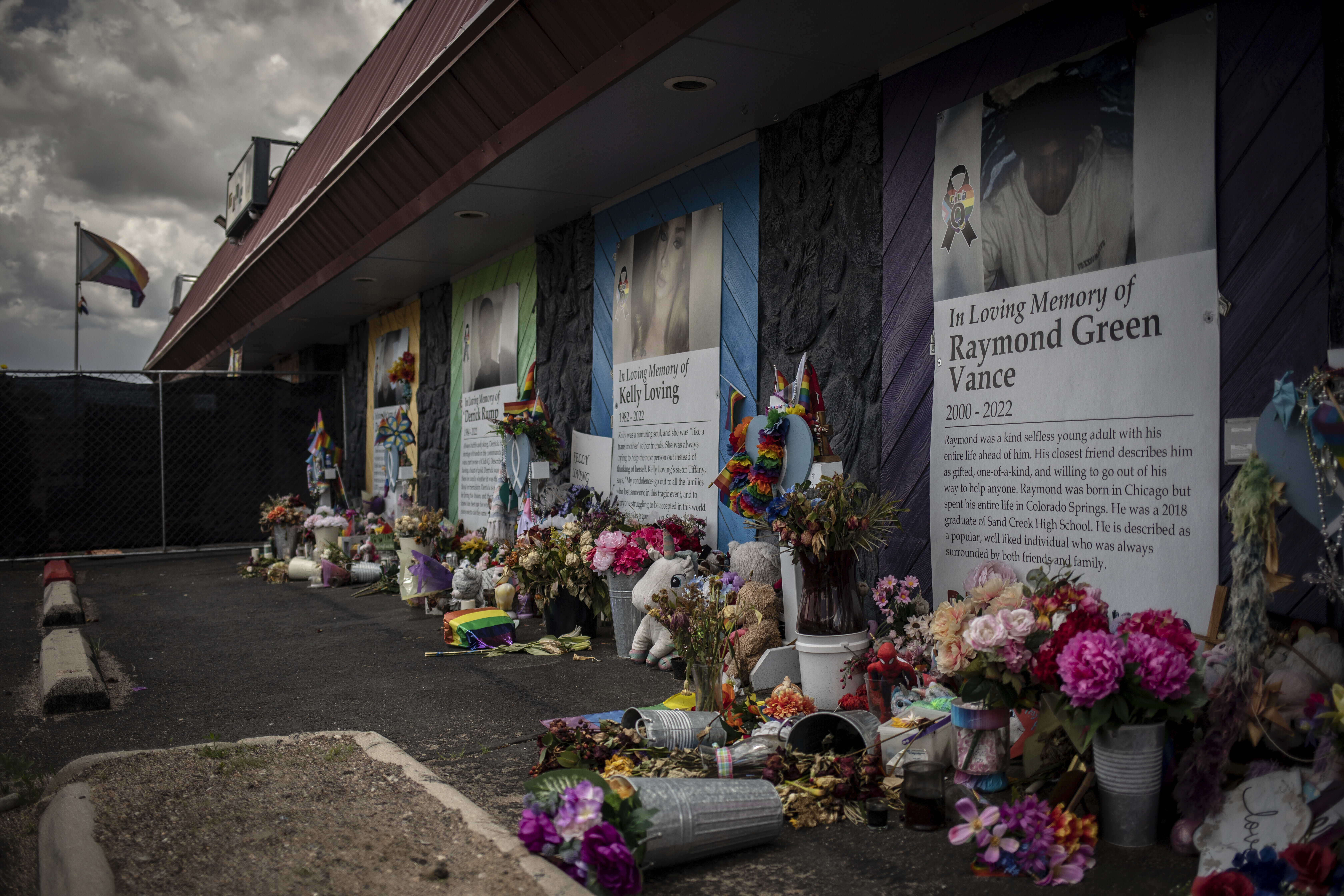 Memorials are displayed outside Club Q, the LGBTQ nightclub that was the site of a deadly 2022 shooting that killed five people, on June 7 in Colorado Springs, Colo. The suspect is expected to take a plea deal.