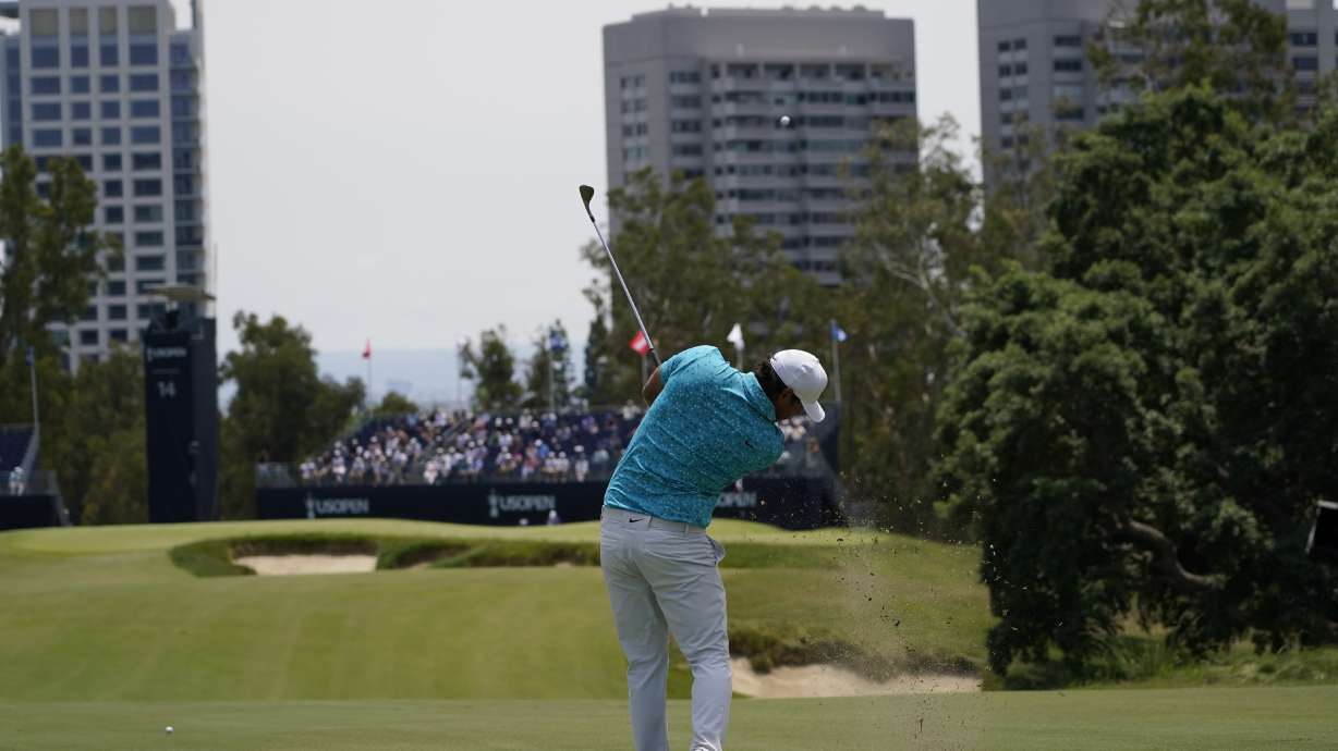 Brooks Koepka hits from the fairway on the 14th hole during a practice round for the U.S. Open Championship golf tournament at The Los Angeles Country Club on Tuesday, June 13, 2023, in Los Angeles.