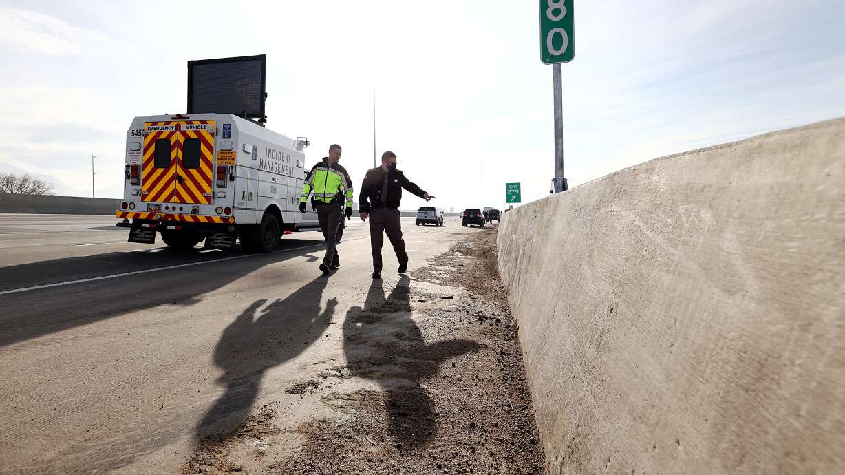 Utah Highway Patrol troopers investigate a road rage shooting on I-15 in Lehi on Jan. 25, 2021. State lawmakers are considering ways to decrease the number of road rage incidents.
