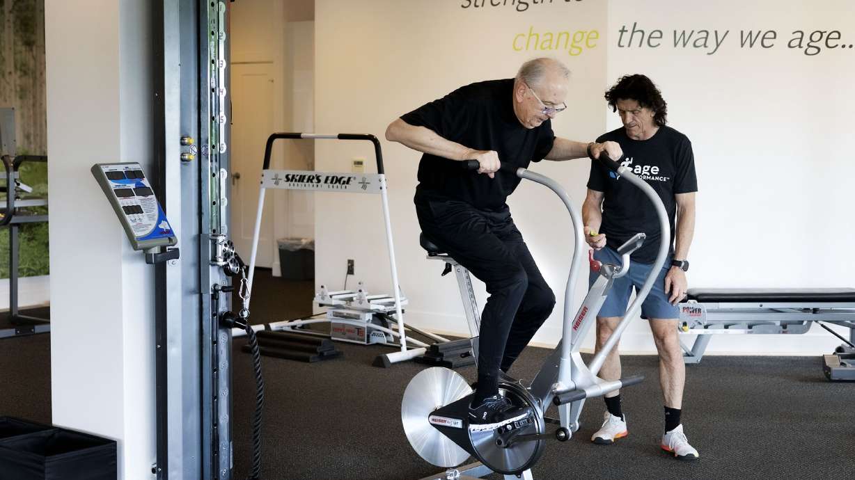 Rich McKeown, 76, works out with Paul Holbrook at Age Performance in Salt Lake City on Wednesday. While older adults often picture Florida as the perfect spot to retire, the Beehive State may deserve future consideration.