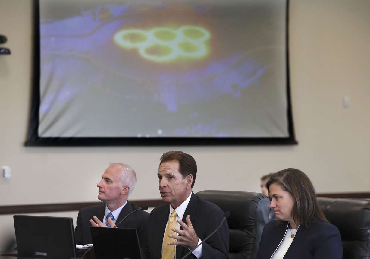 Darren Hughes, bid lead for the Salt Lake City-Utah Committee for the Games, left, Fraser Bullock, committee president and CEO, and Catherine Raney Norman, committee chairwoman, speak during the first meeting of Utah Legislature’s Olympic Coordination Committee at the Capitol in Salt Lake City on Thursday.