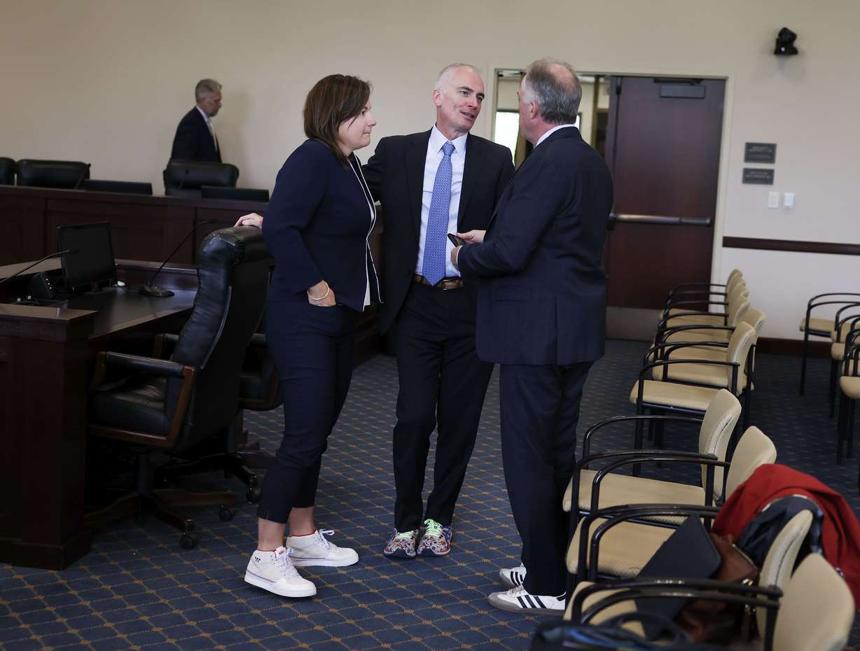 Catherine Raney Norman, chairwoman of the Salt Lake City-Utah Committee for the Games, Darren Hughes, the committee’s bid lead, and Colin Hilton, CEO of the Utah Olympic Legacy Foundation, confer following the first meeting of Utah Legislature’s Olympic Coordination Committee at the Capitol in Salt Lake City on Thursday.