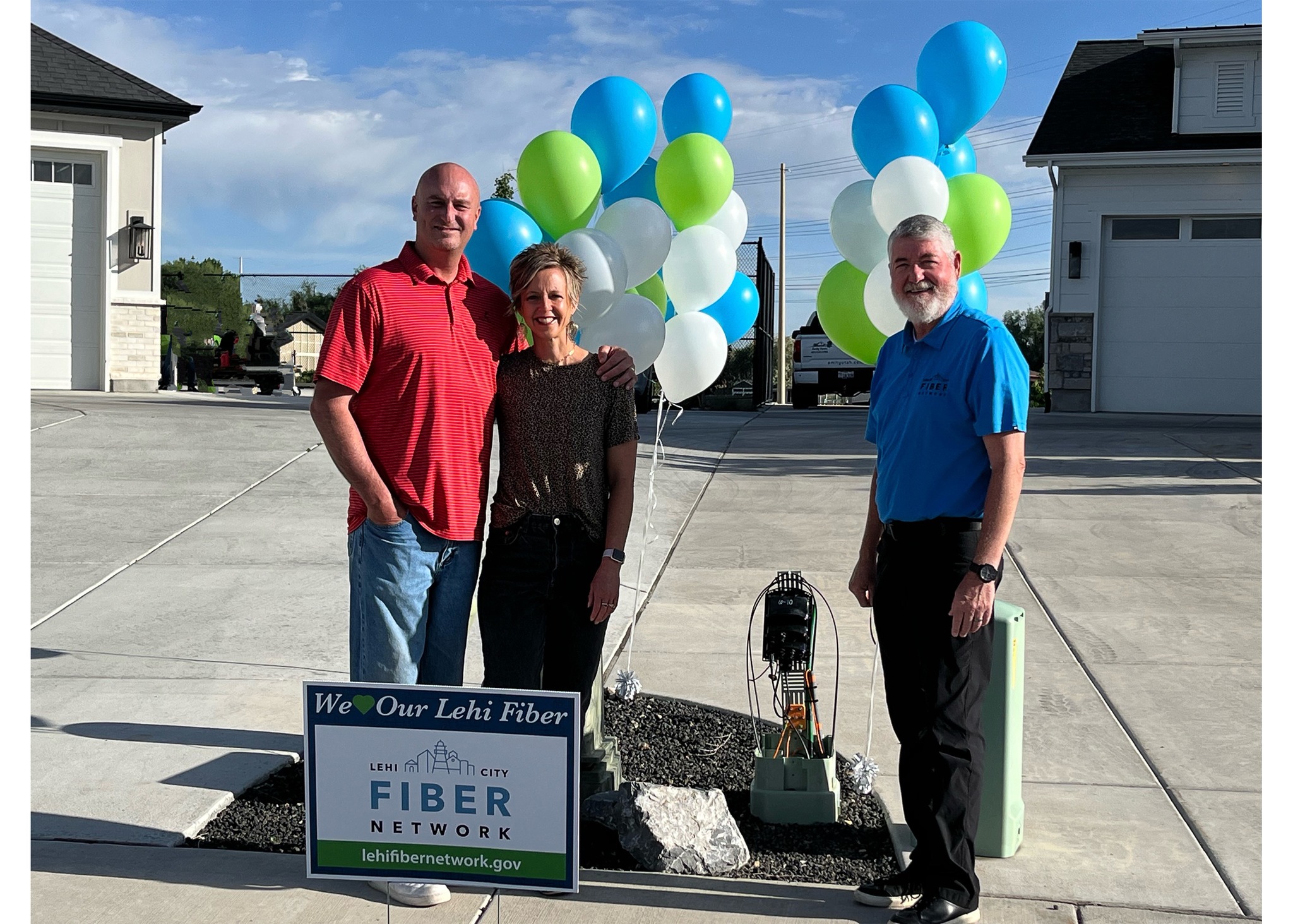 The Peterson family poses with Lehi Mayor Mark Johnson on June 12 after their house was the first residence in the city to connect to the Lehi Fiber Network.
