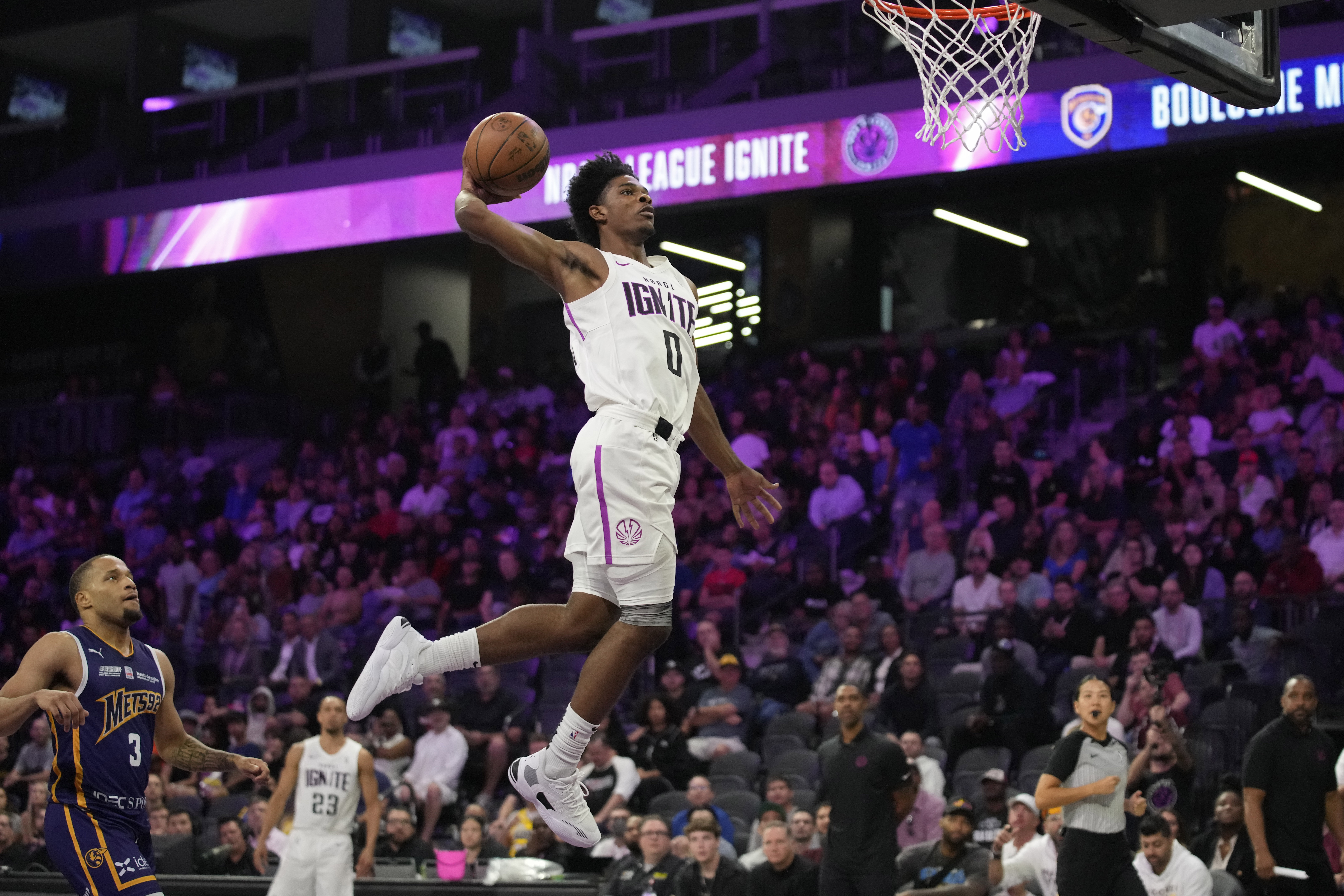 FILE - NBA G League Ignite's Scoot Henderson dunks against the Boulogne-Levallois Metropolitans 92 during the first half of an exhibition basketball game Oct. 4, 2022, in Henderson, Nev. Henderson is among the top guards in the upcoming NBA draft.