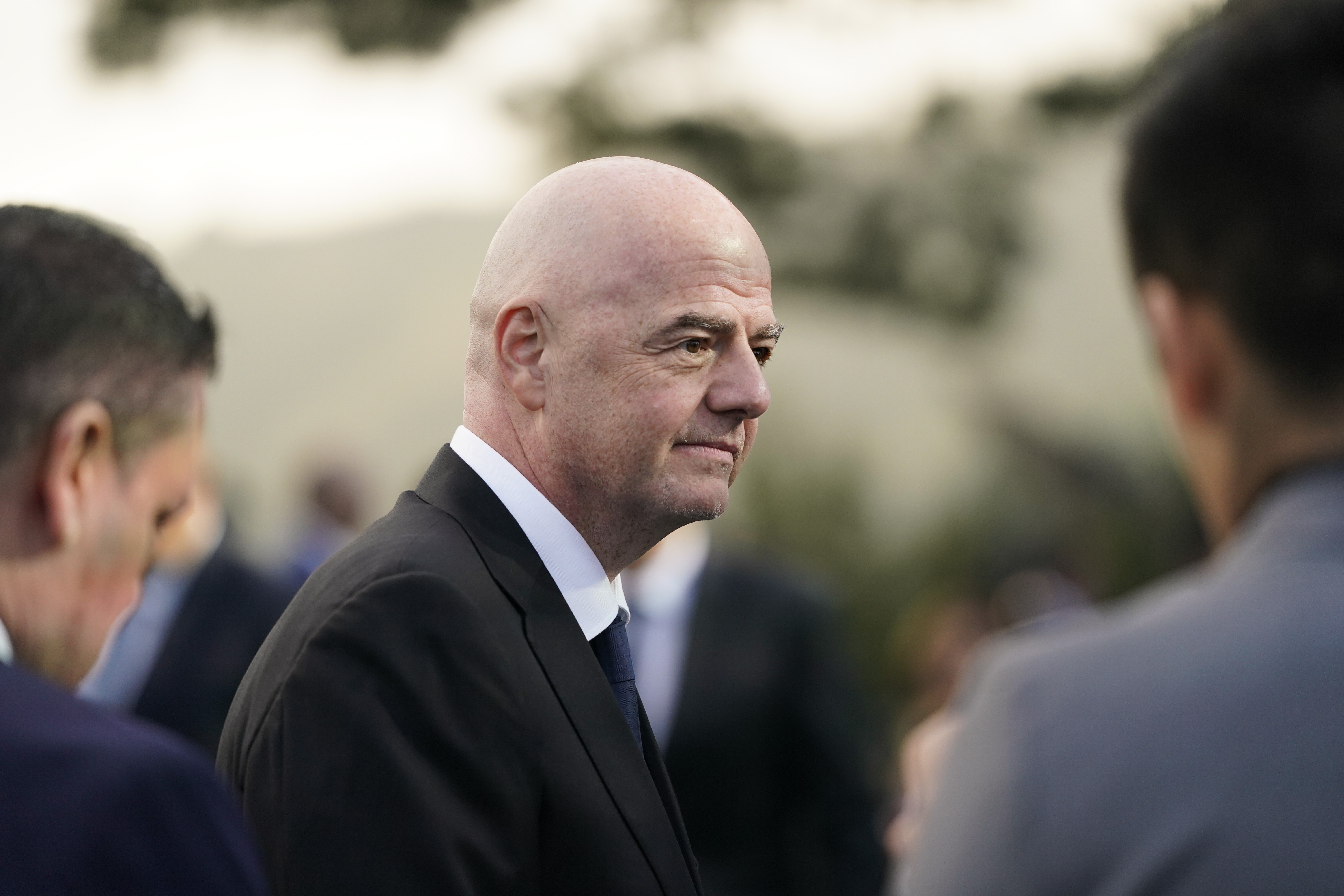 FIFA President Gianni Infantino talks to reporters as he arrives for a ceremony unveiling the official brand of soccer's 2026 World Cup, at Griffith Observatory in Los Angeles on Wednesday, May 17, 2023. 