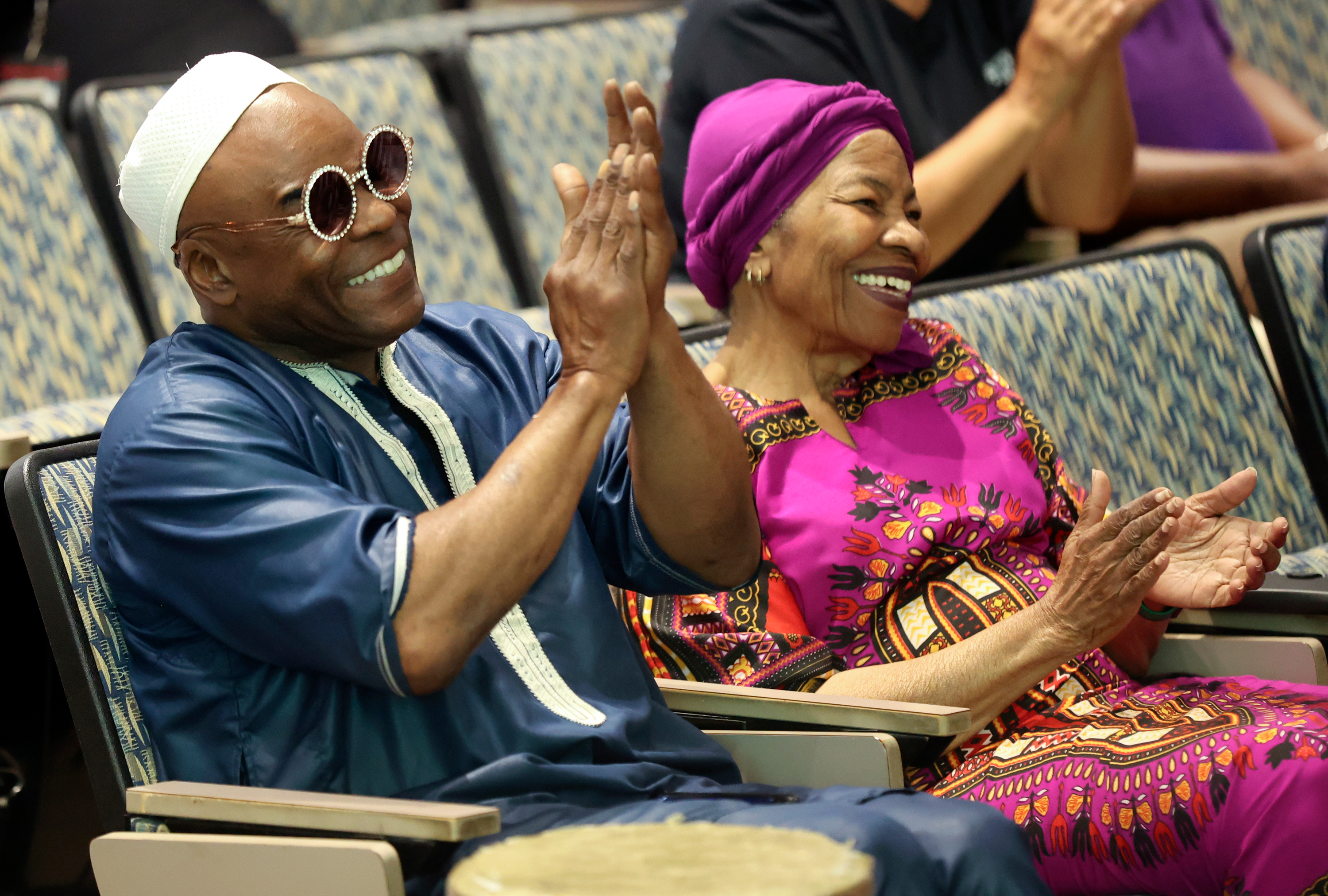 Everett Spencer and Charlotte Starks applaud during a Juneteenth celebration at the Salt Lake County Government Center in Salt Lake City on Friday.